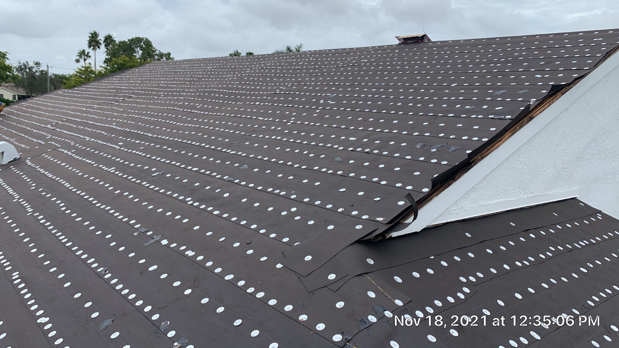 Residential Roofing Installation using 1" Nail strip metal roof by BLUES BROTHERS ROOFING