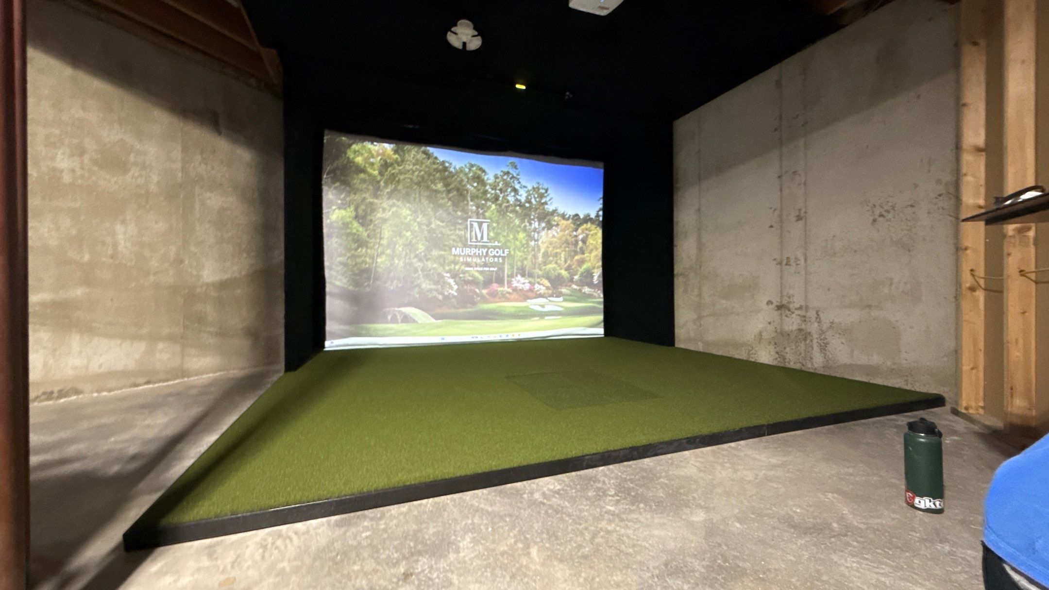 Rex Went With A Custom Golf Simulator  by Banner Garage