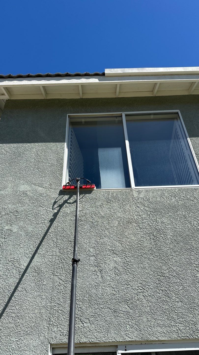 House washing, window cleaning, and screen repair by Property Cleaning Experts