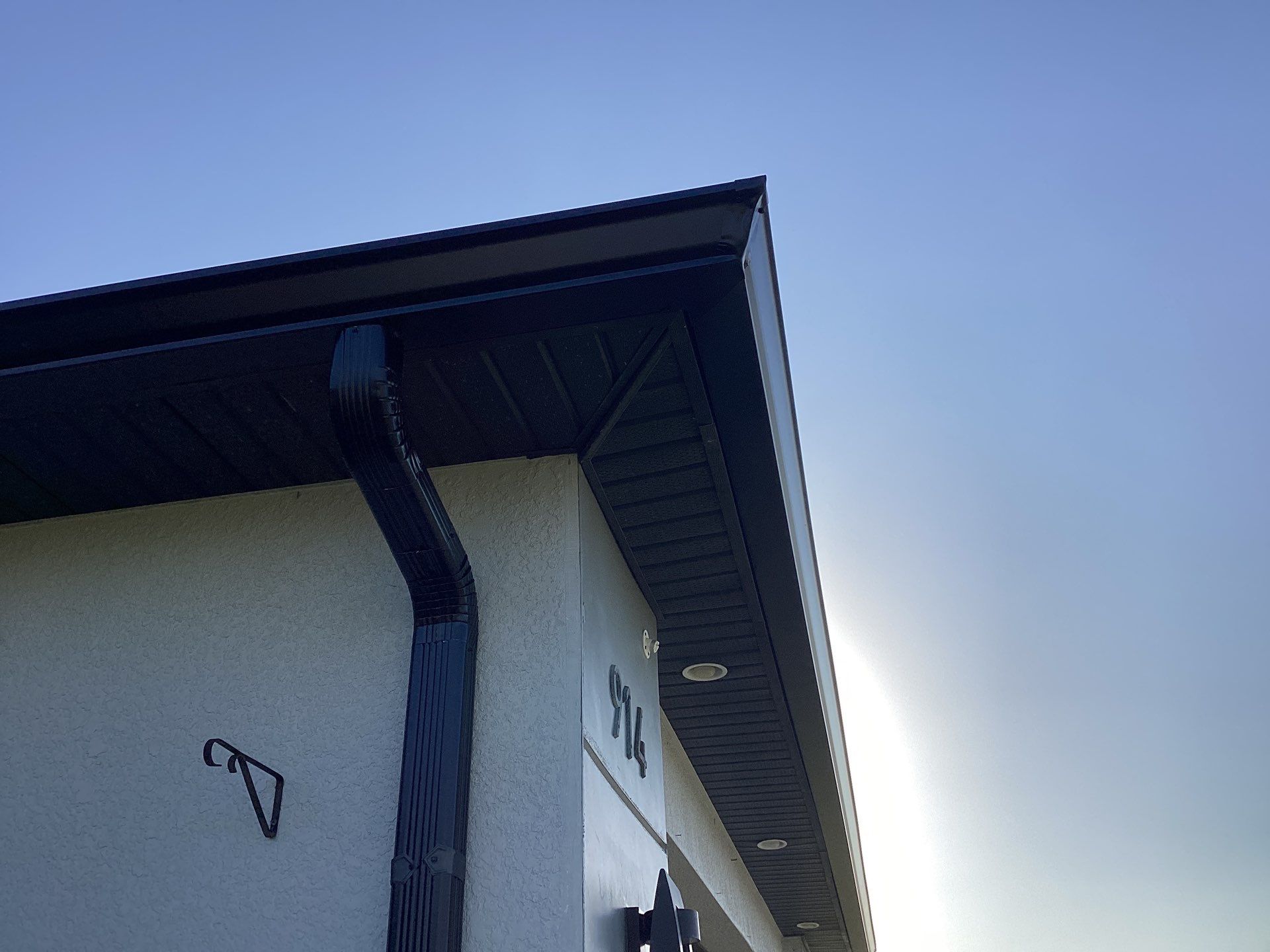 Black Seamless Gutters using 6 Inch Seamless Gutters in Cape Coral FL by Gutter Professors