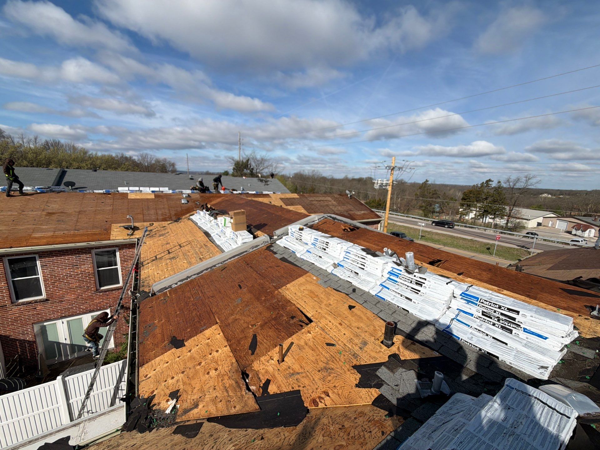 Multi-Unit Roof Replacement and Decking Repair in St. Louis by Acute Roofing And Exteriors 