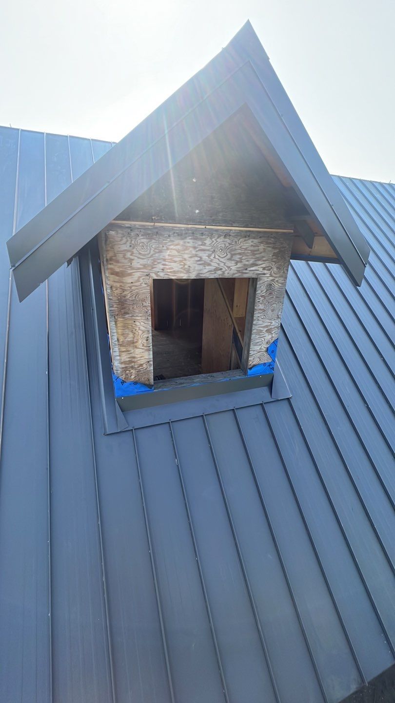 Agricultural Roofing Installation using 12" Prolok metal  by Top Notch Roofing Inc