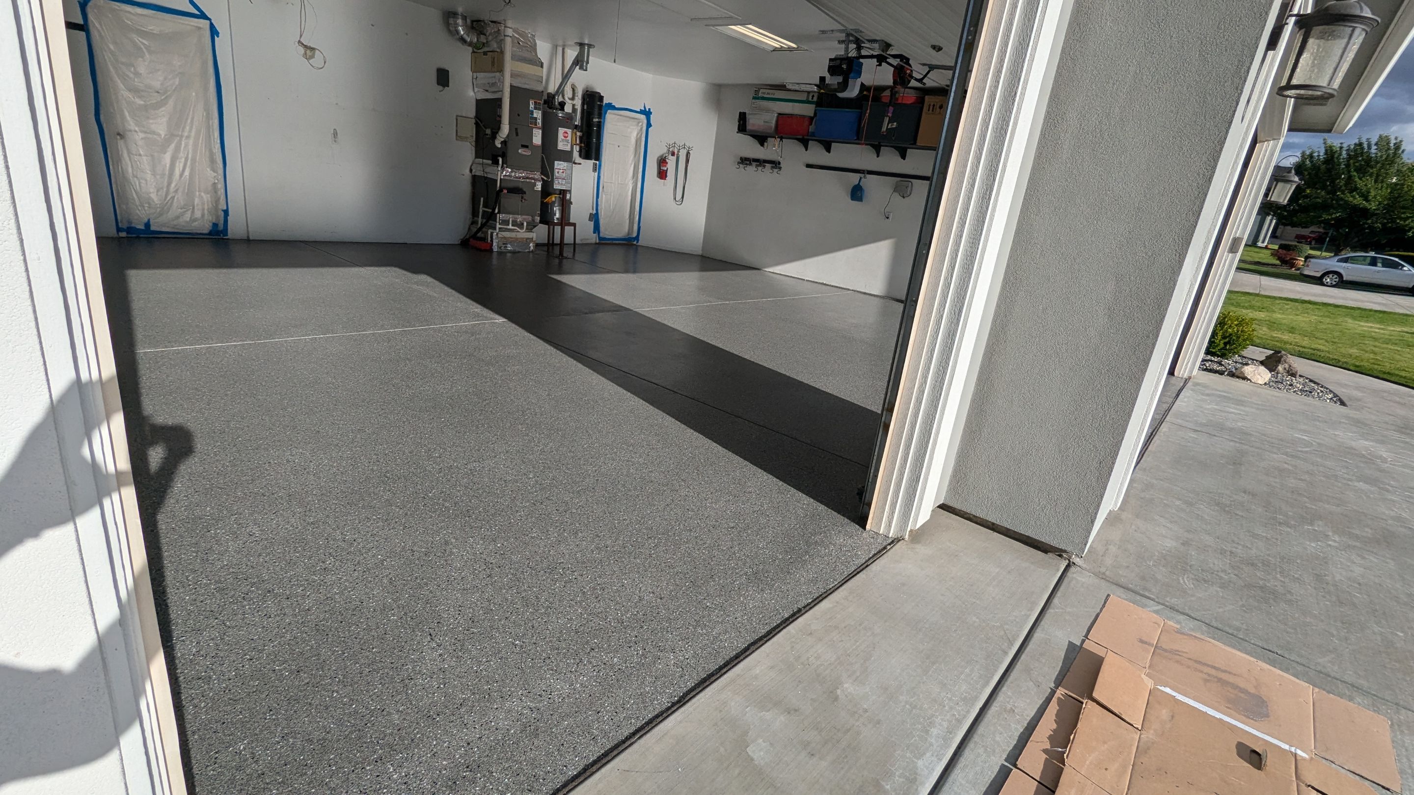 Garage Transformation using Slate Hybrid by Croc Coatings, LLC