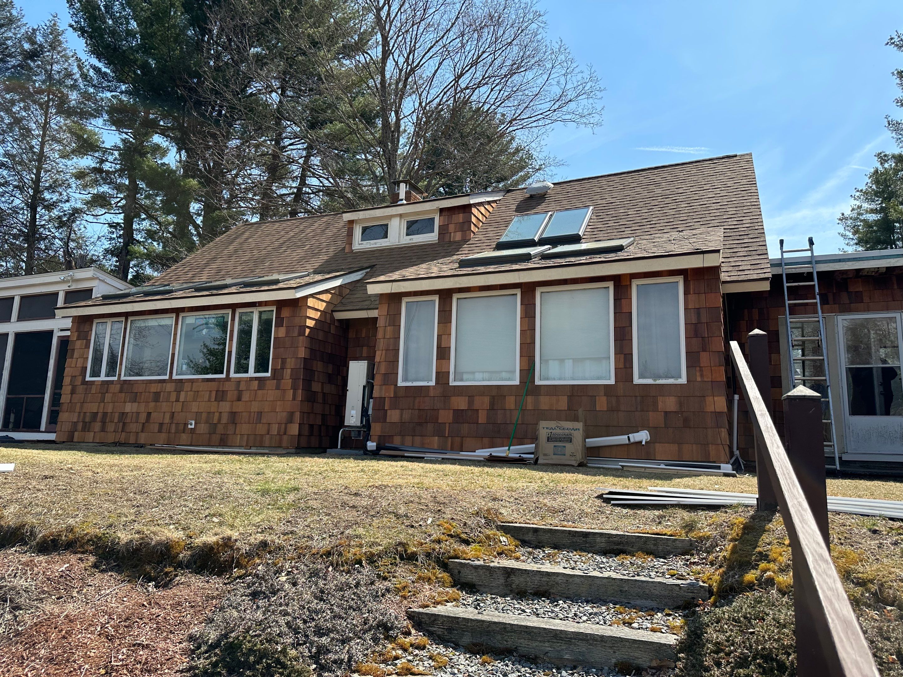 Siding Installation using Perfection Red Western Cedar Shingles  by Loyalty Exterior Solutions 
