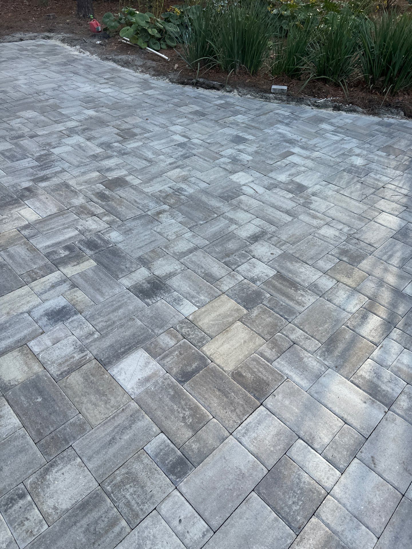 Custom Paver Driveway and Textured Pool Deck Installation in Hilton Head Island by Lowcountry Scapes, LLC