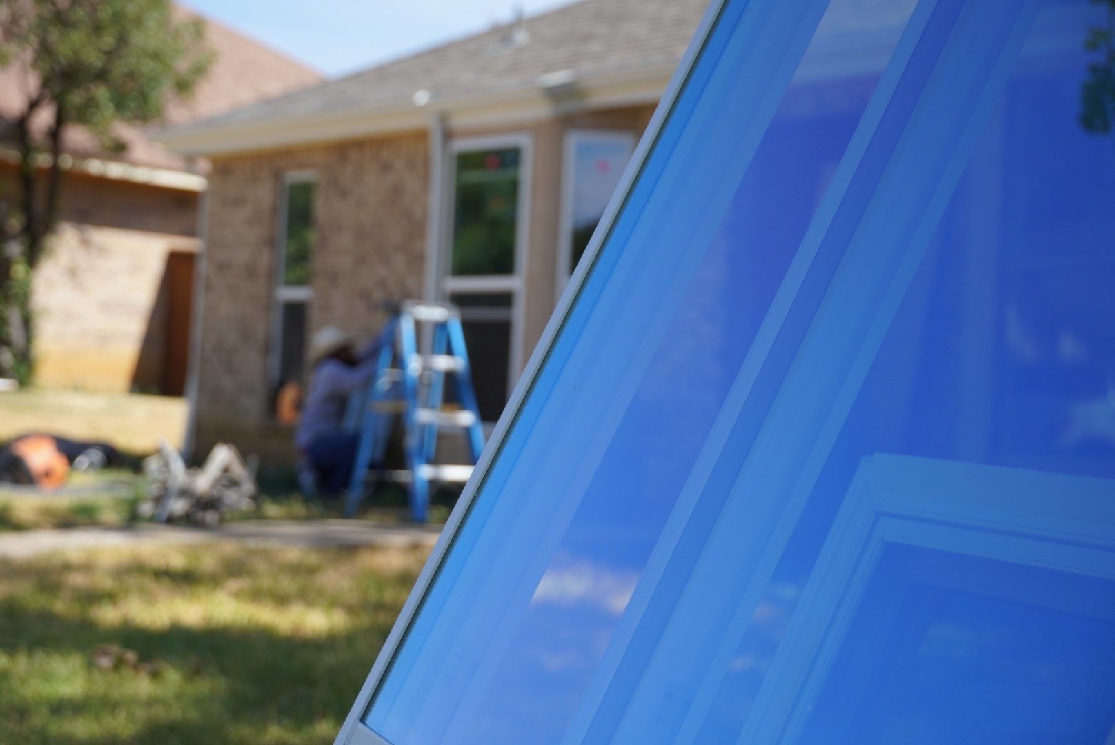 Low-E Window Replacement by First Out Roofing 