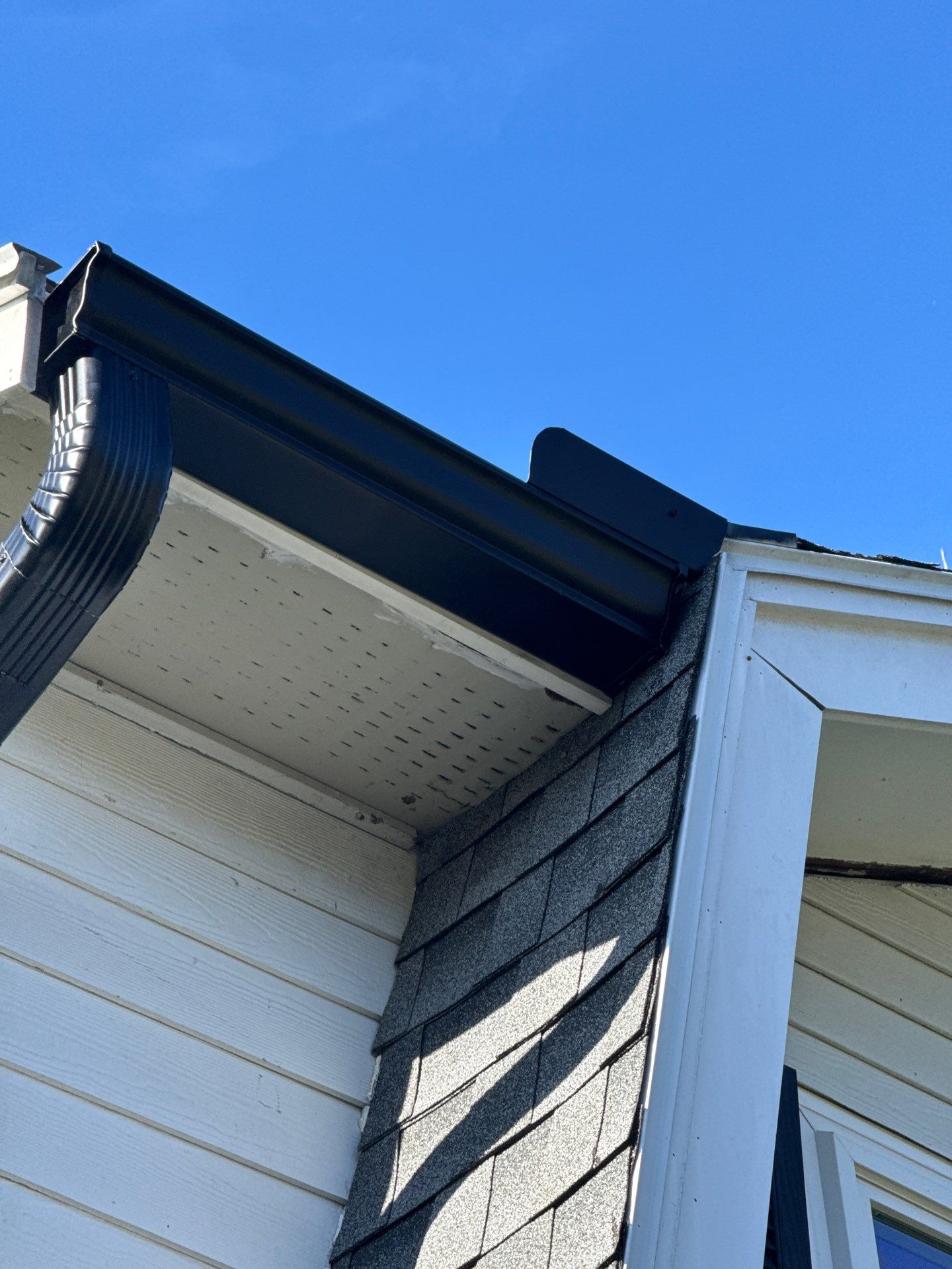 Seamless Black Gutter & Fascia Upgrade | Methuen, MA by Mighty Dog Roofing of Greater Middlesex County