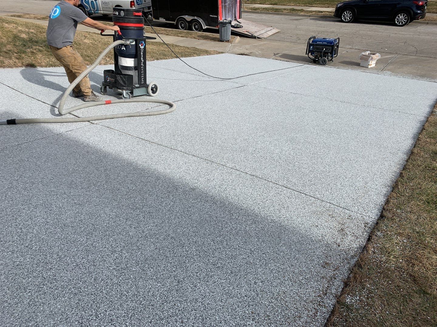 Driveway using Slate Stone by Select Painting, Coatings & Garage Cabinets