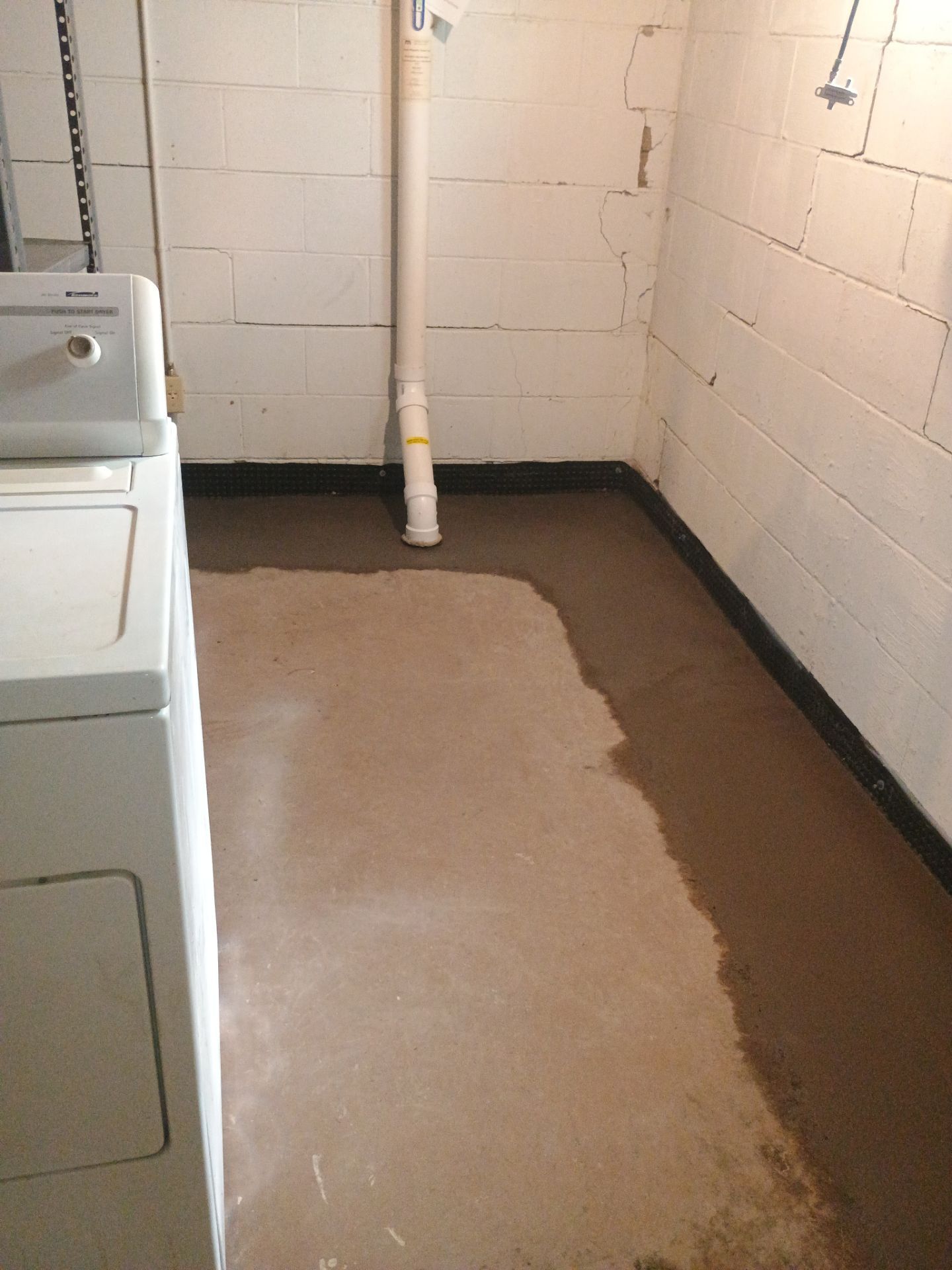 Interior Drain Tile Installation in South Minneapolis by Waterproofing Northeast