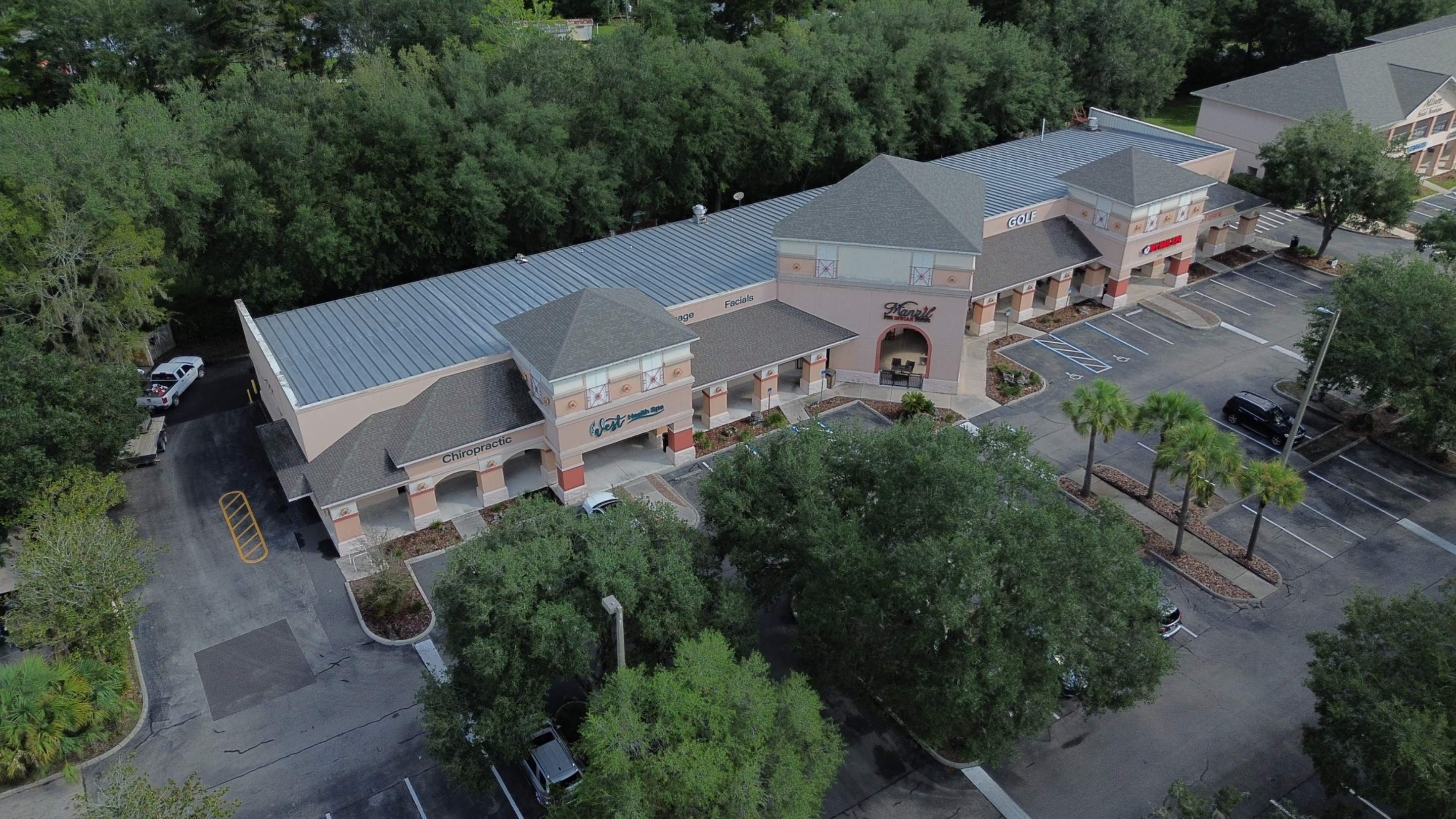 Reroofing a Commercial Building on Archer Road Gainesville, FL by Brehm Roofing