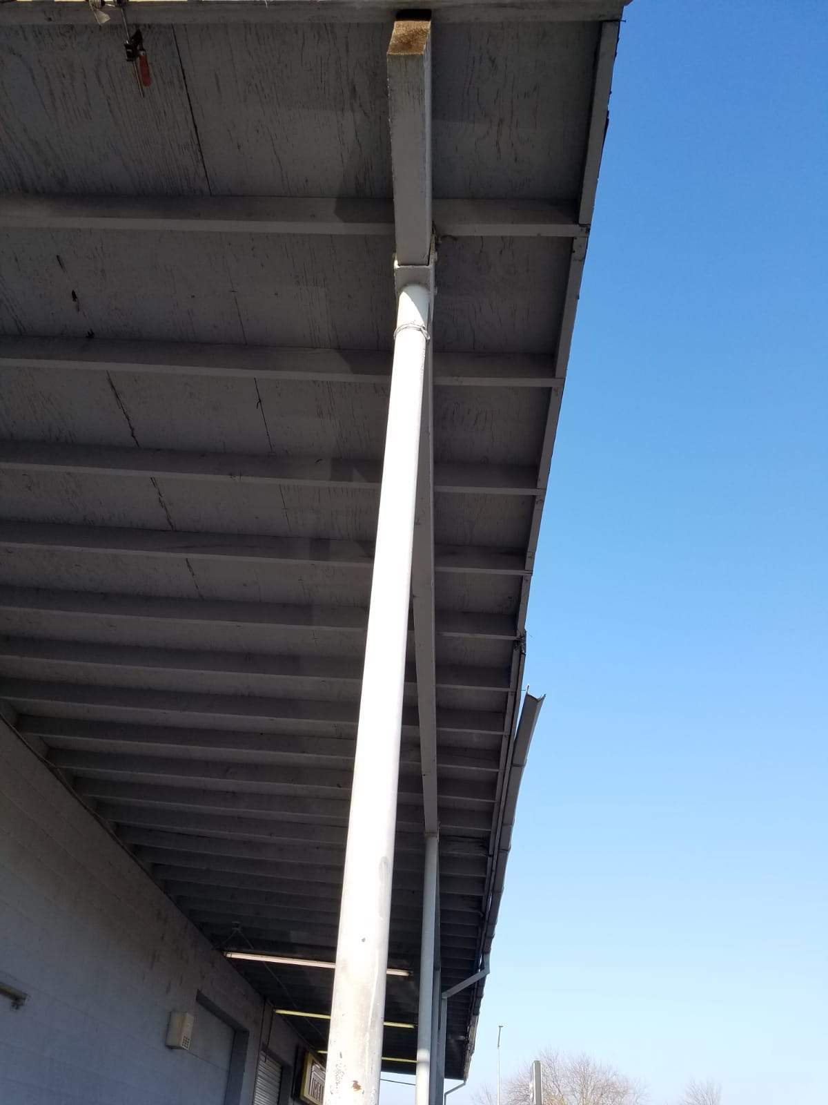 Spray foam and coatings using Conklin Benchmark/PUMA XL coatings and spray foam by Straight Edge Roofing Inc