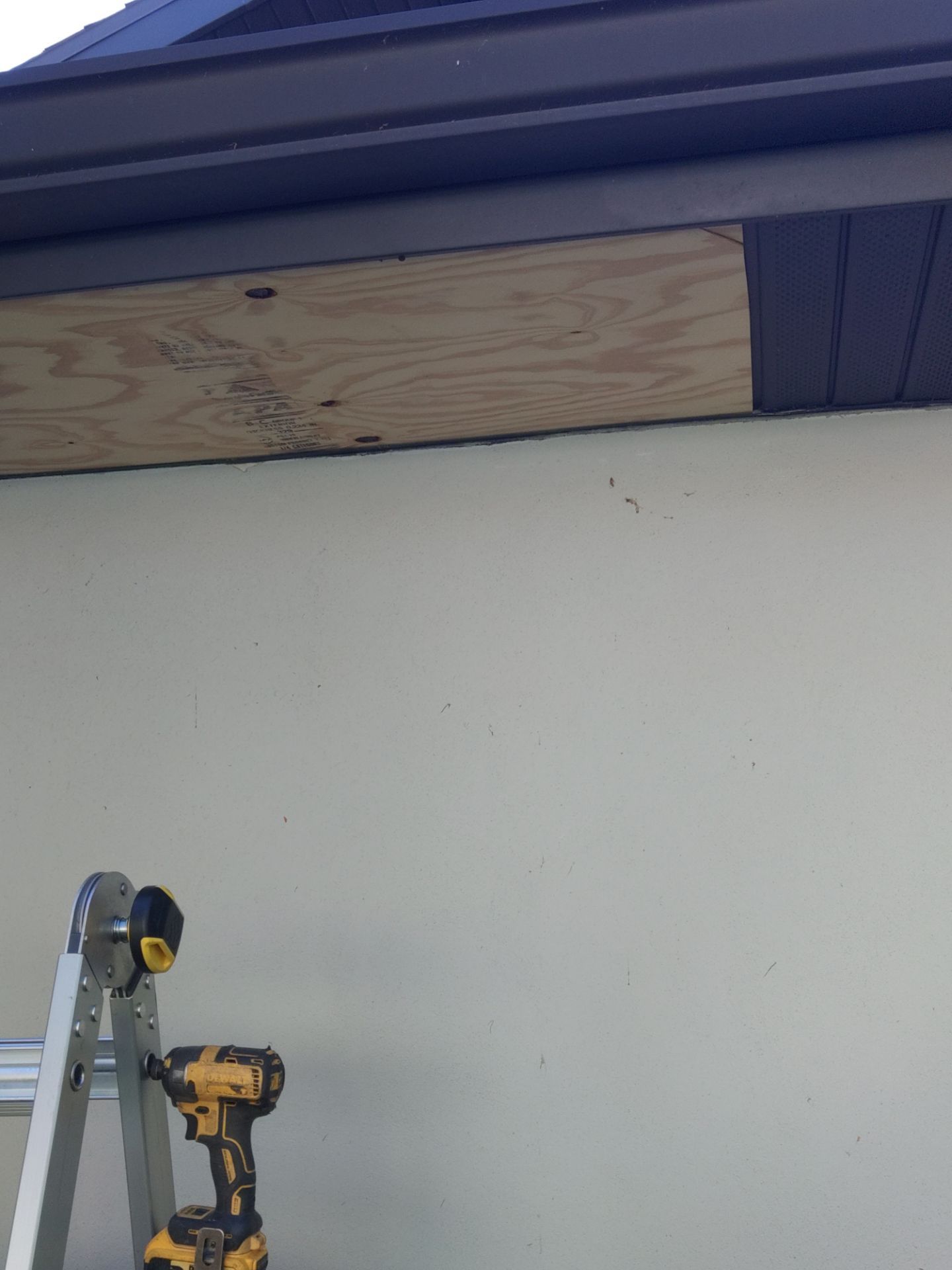 Dark Bronze Soffit Installation in Sarasota FL by Gutter Professors