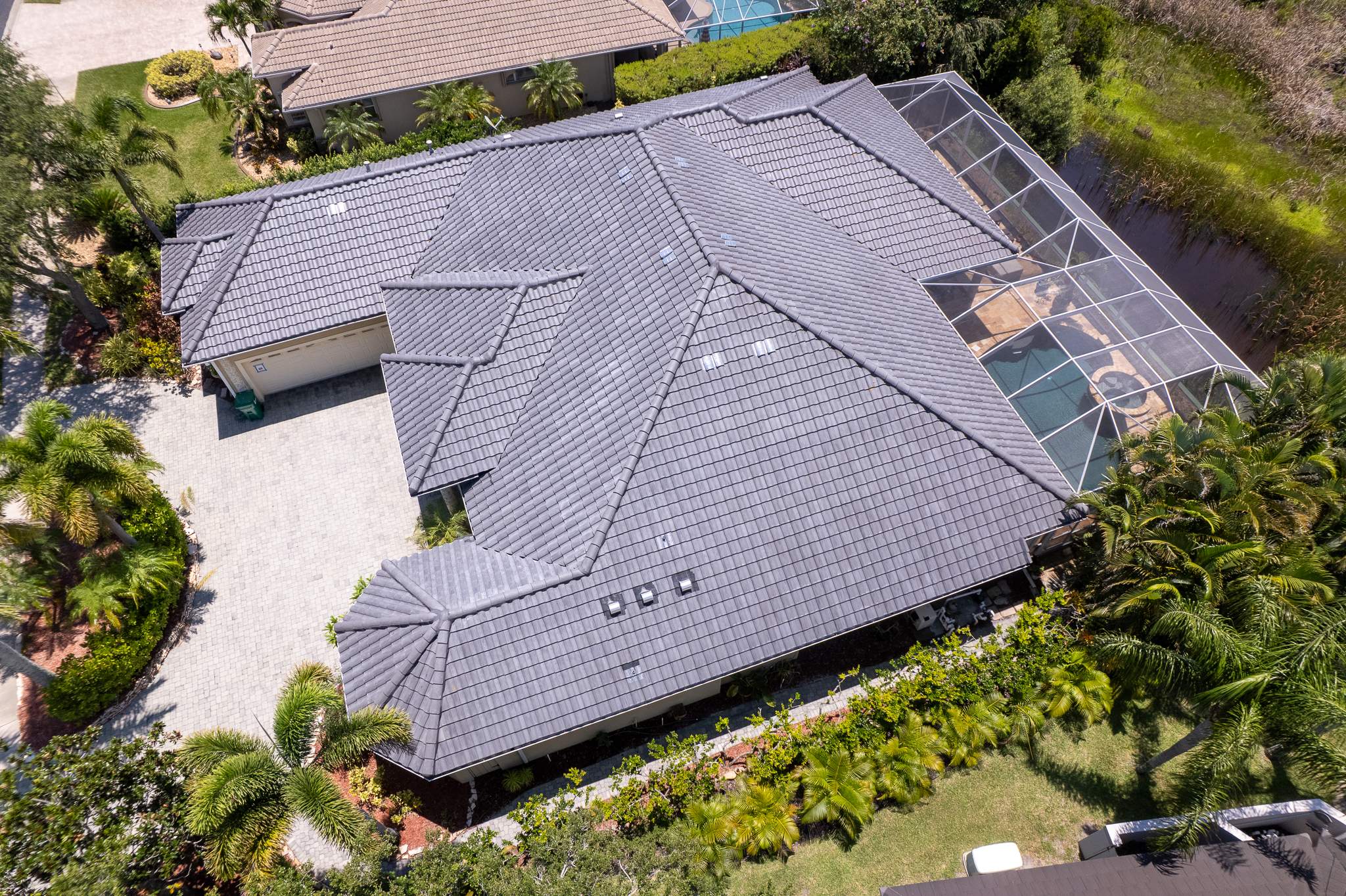 Residential Tile Roof Replacement with Skylight Integration in Melbourne by Wiedmann Construction & Roofing