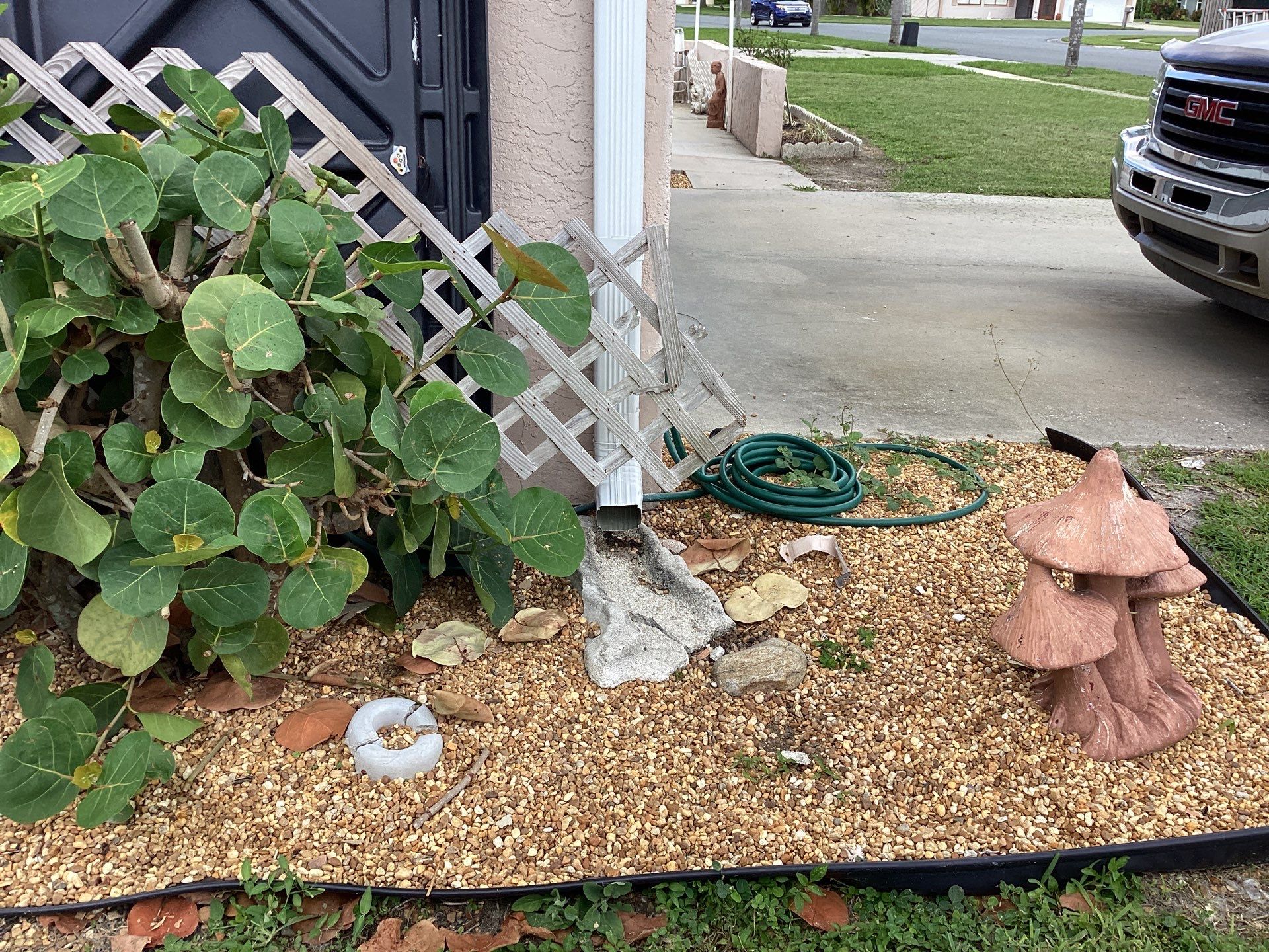 White Seamless Gutters and Splash Guards in Fort Myers FL by Gutter Professor by Gutter Professors