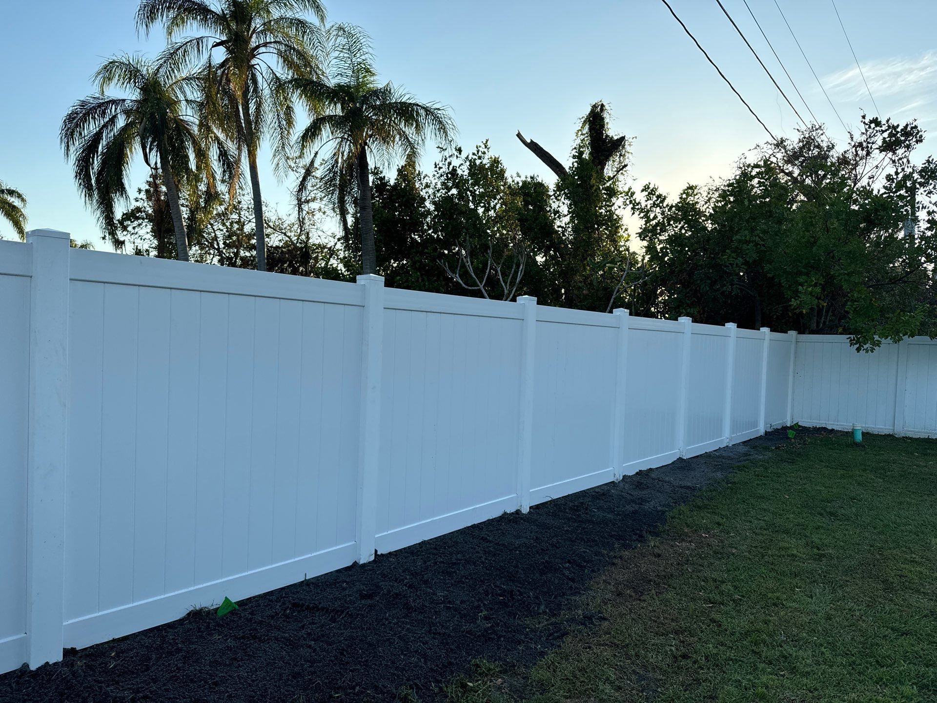 Vinyl Fence Installation using 6Ft White Vinyl Privacy Fence and a 4Ft White Vinyl Picket Fence by Asap fence and gates, LLC