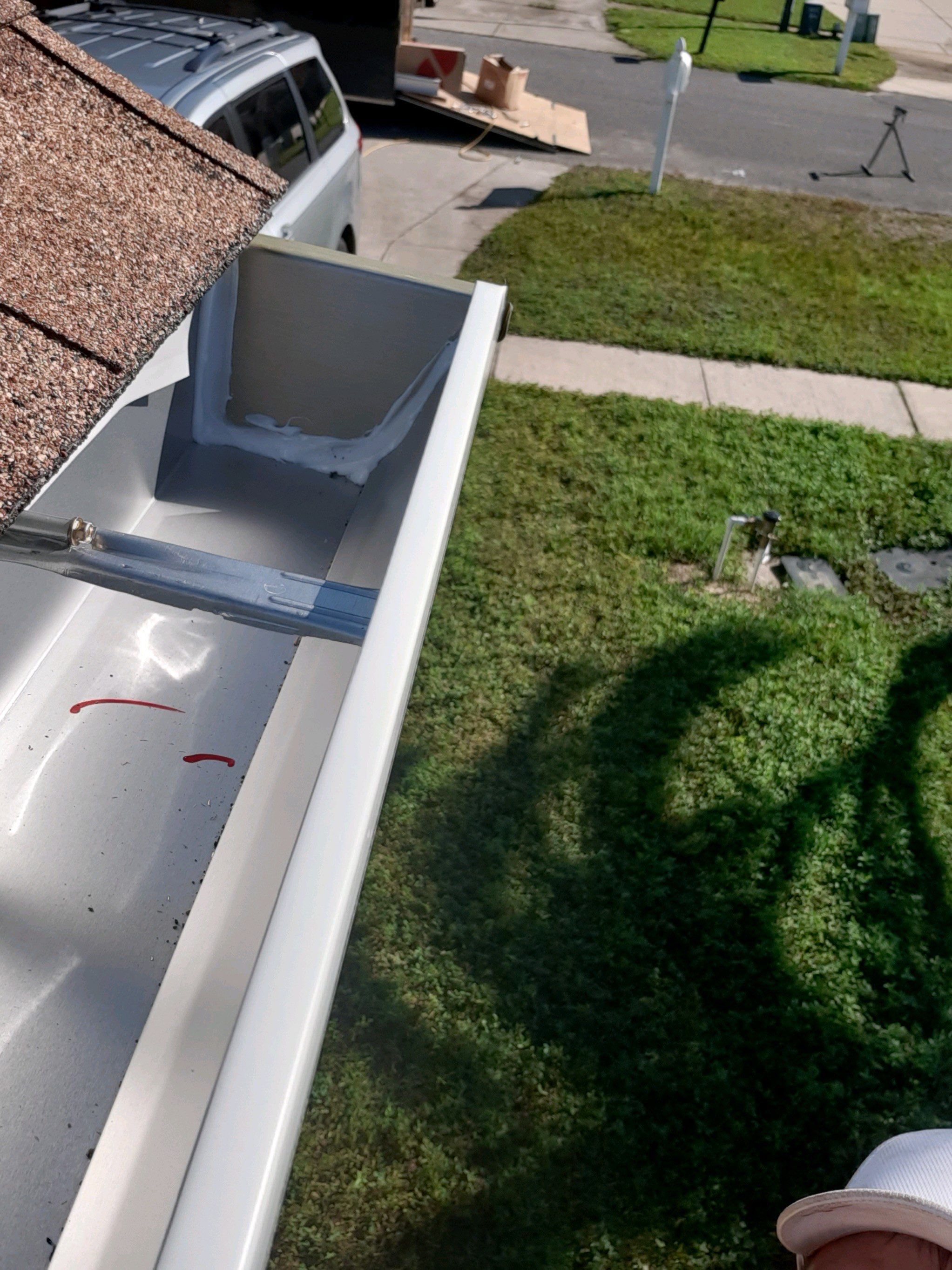 Seamless Gutter Installation using White K-Style Gutters by Gutter Professors