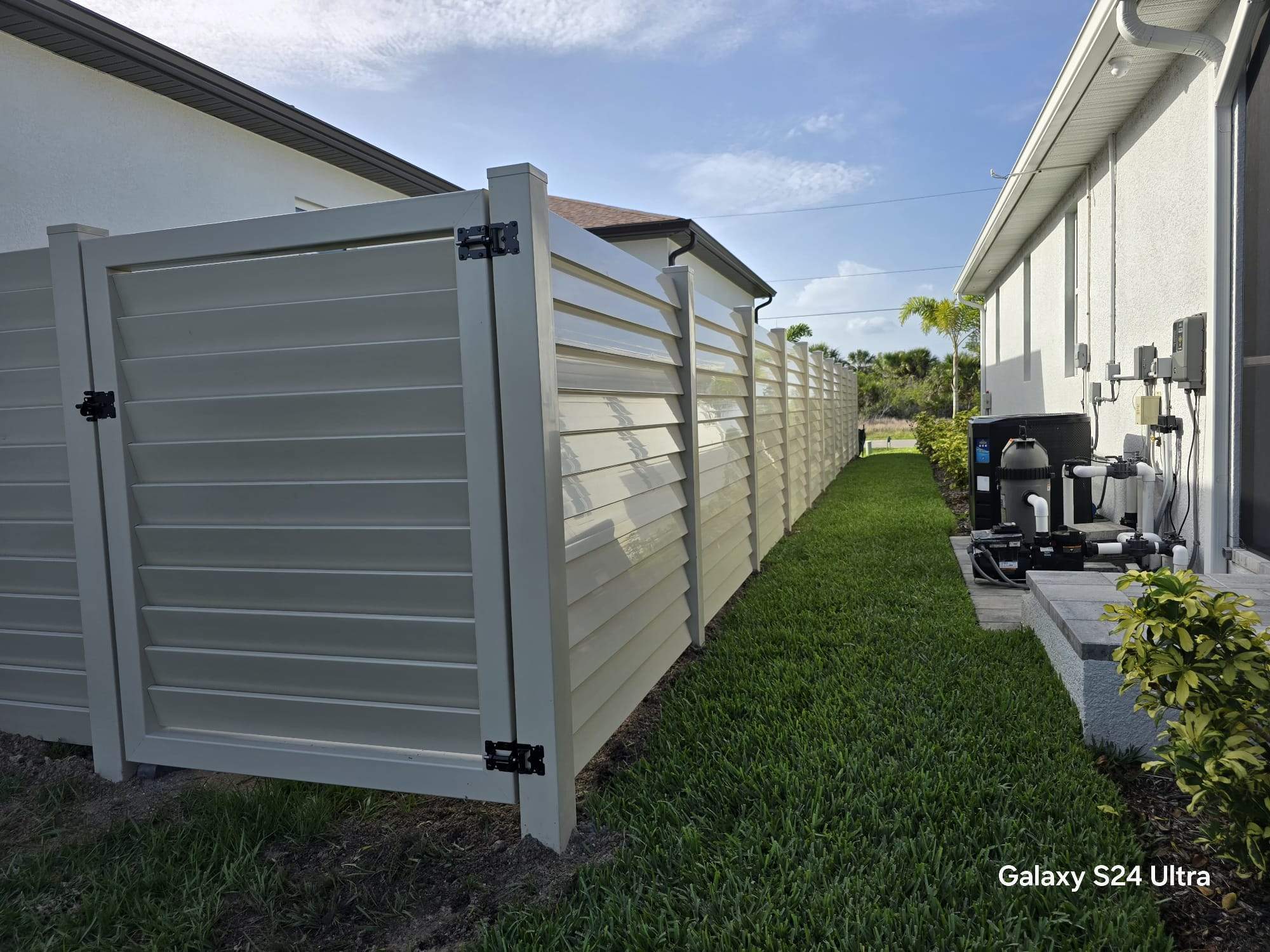 Tan Louvered Vinyl in Port Charlotte by True Fence LLC