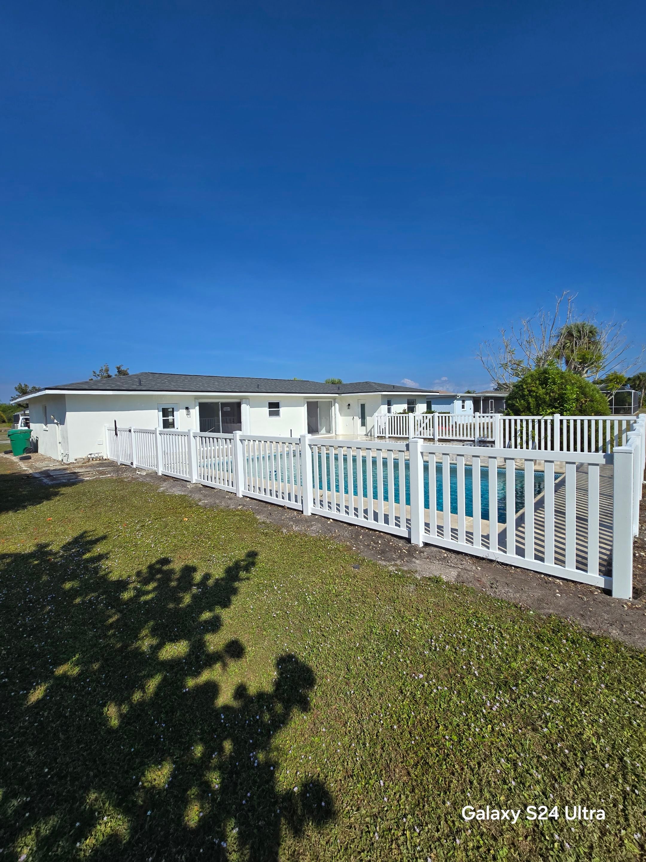 Vinyl Picket Fence for Pool in Port Charlotte by True Fence LLC