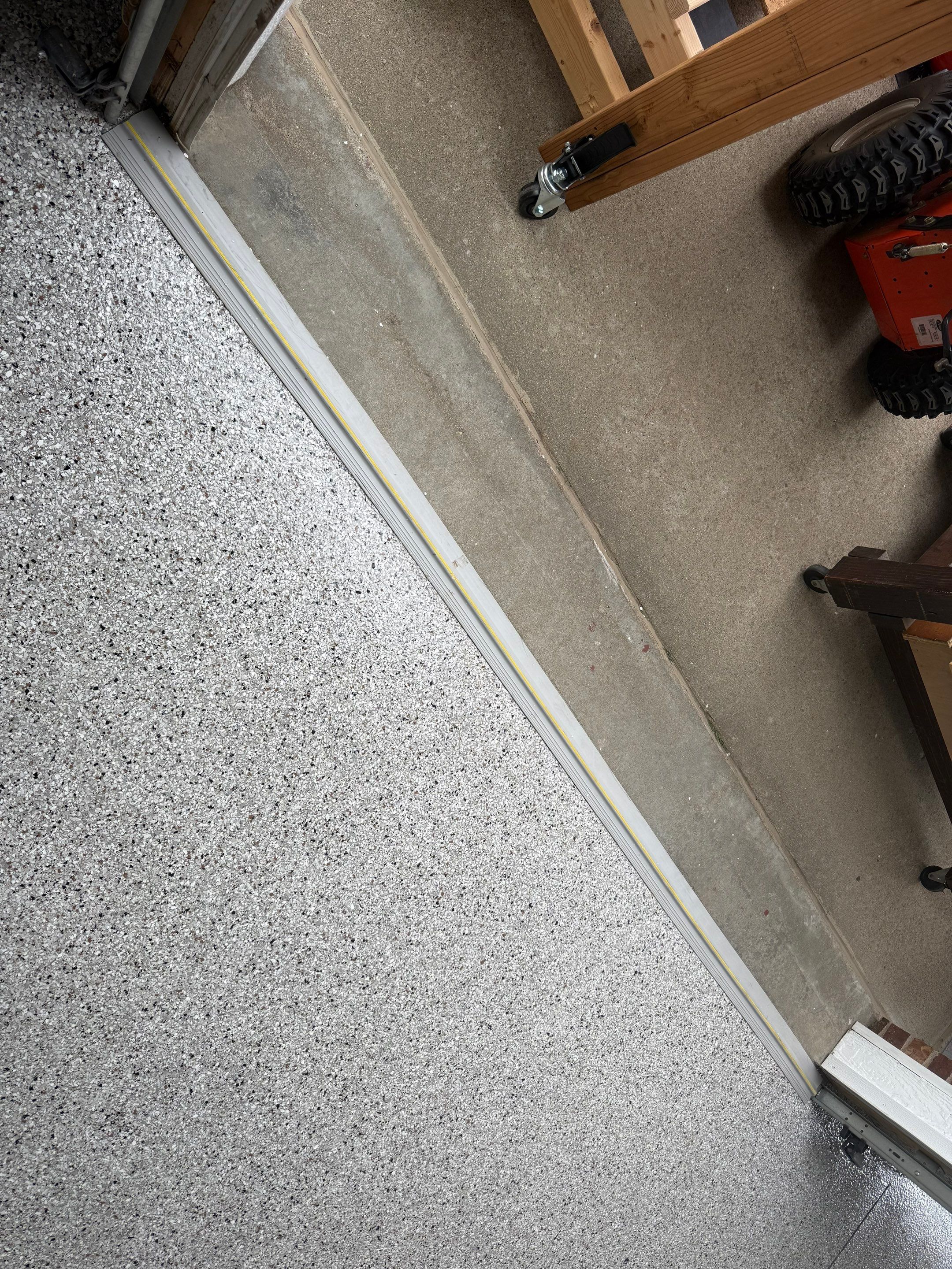 High-Gloss Epoxy Garage Floor Coating in Sioux Falls by Select Painting, Coatings & Garage Cabinets