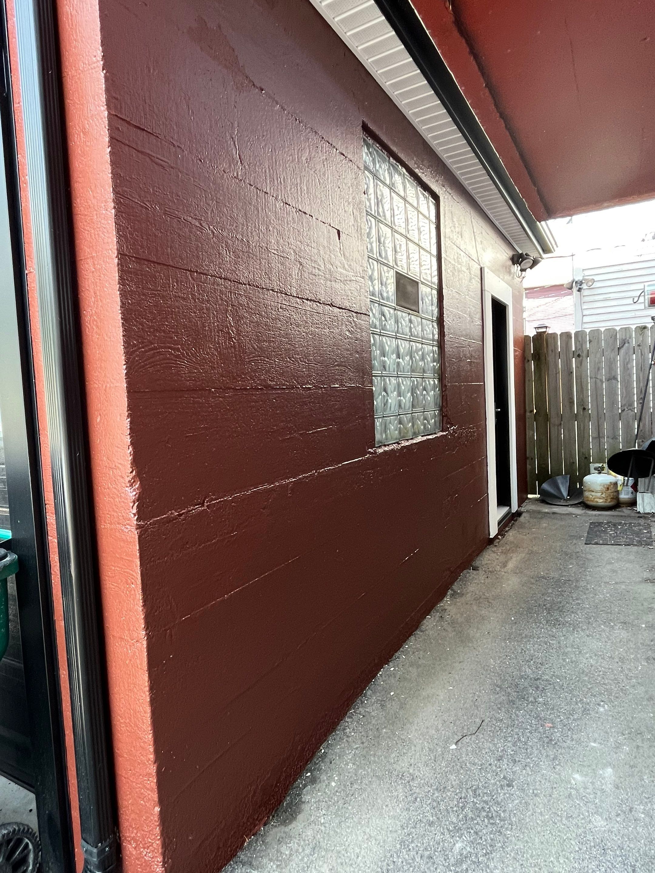 Exterior Renovations- Siding, Stamped Concrete, Porch, and Railings by Ivy Lea Construction