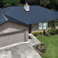 24ga 1.5" Mechanical Seam Matte Black by Total Roofing System The Metal Roof Experts