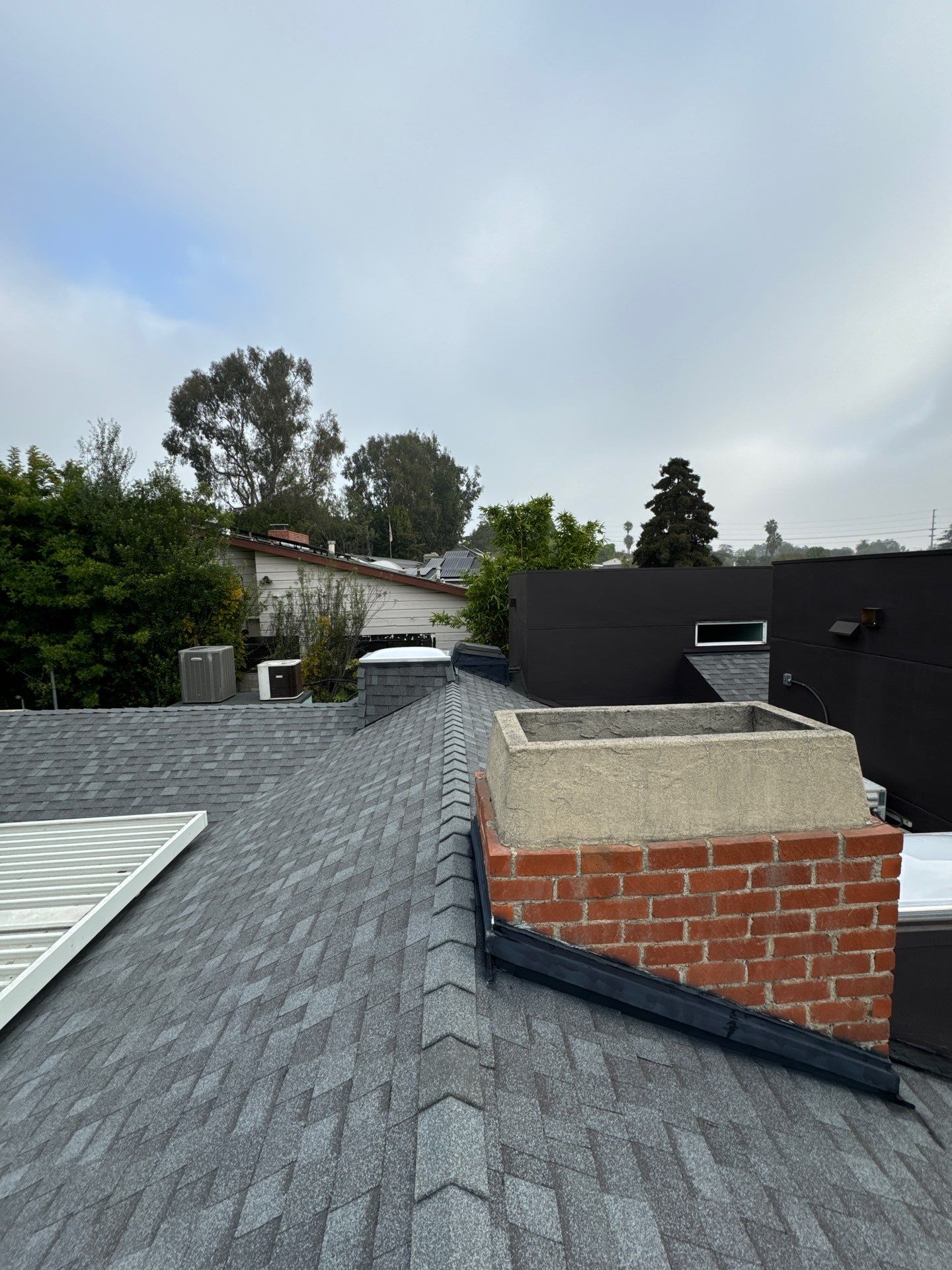 Residential Roofing Installation using Shingles and Silicone by Hull Brothers Roofing