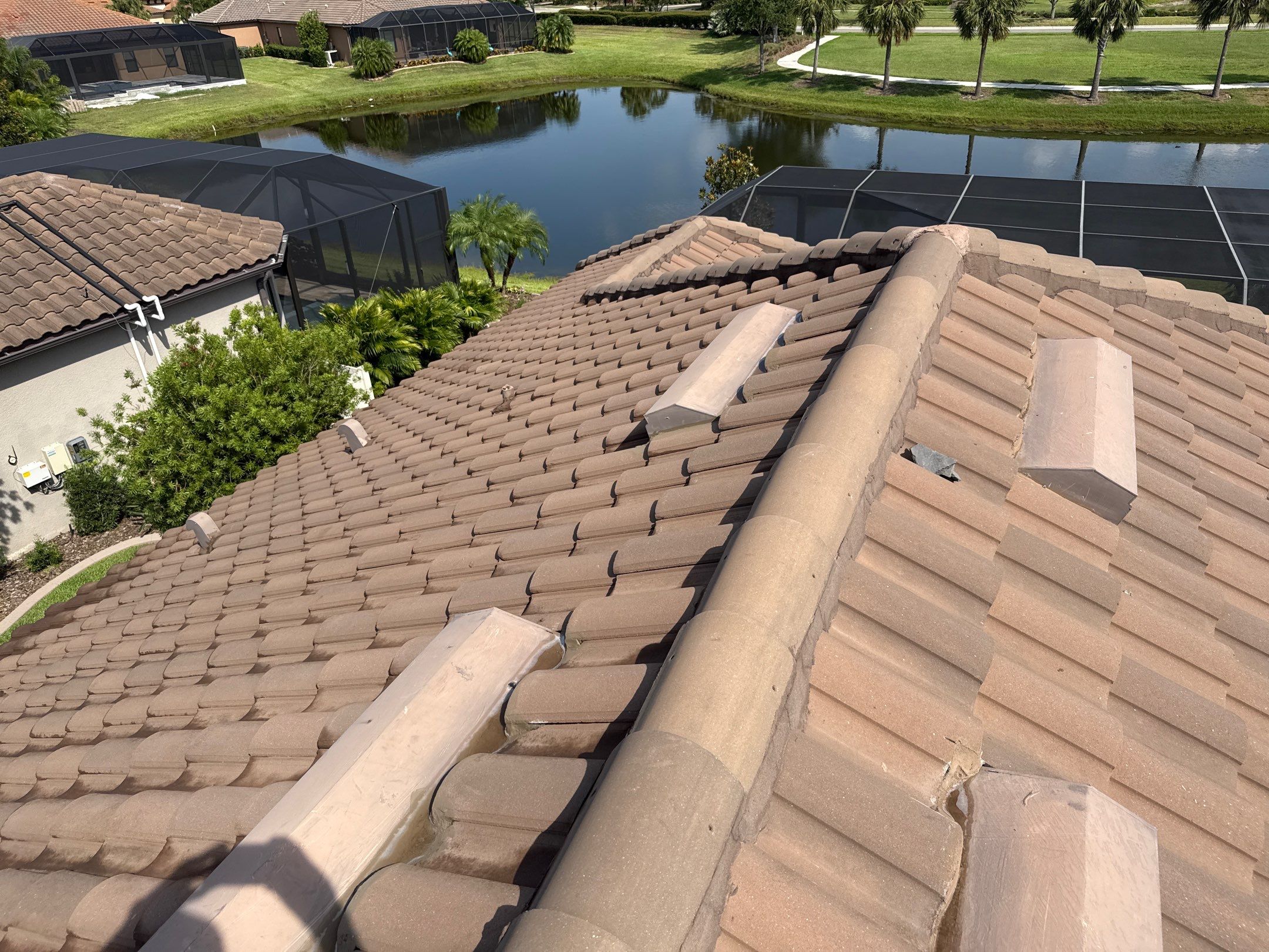Soft Wash Roof Cleaning – Concrete Tile Roof | Artisan Lakes Esplanade, Palmetto, FL by Sunshine AquaWash