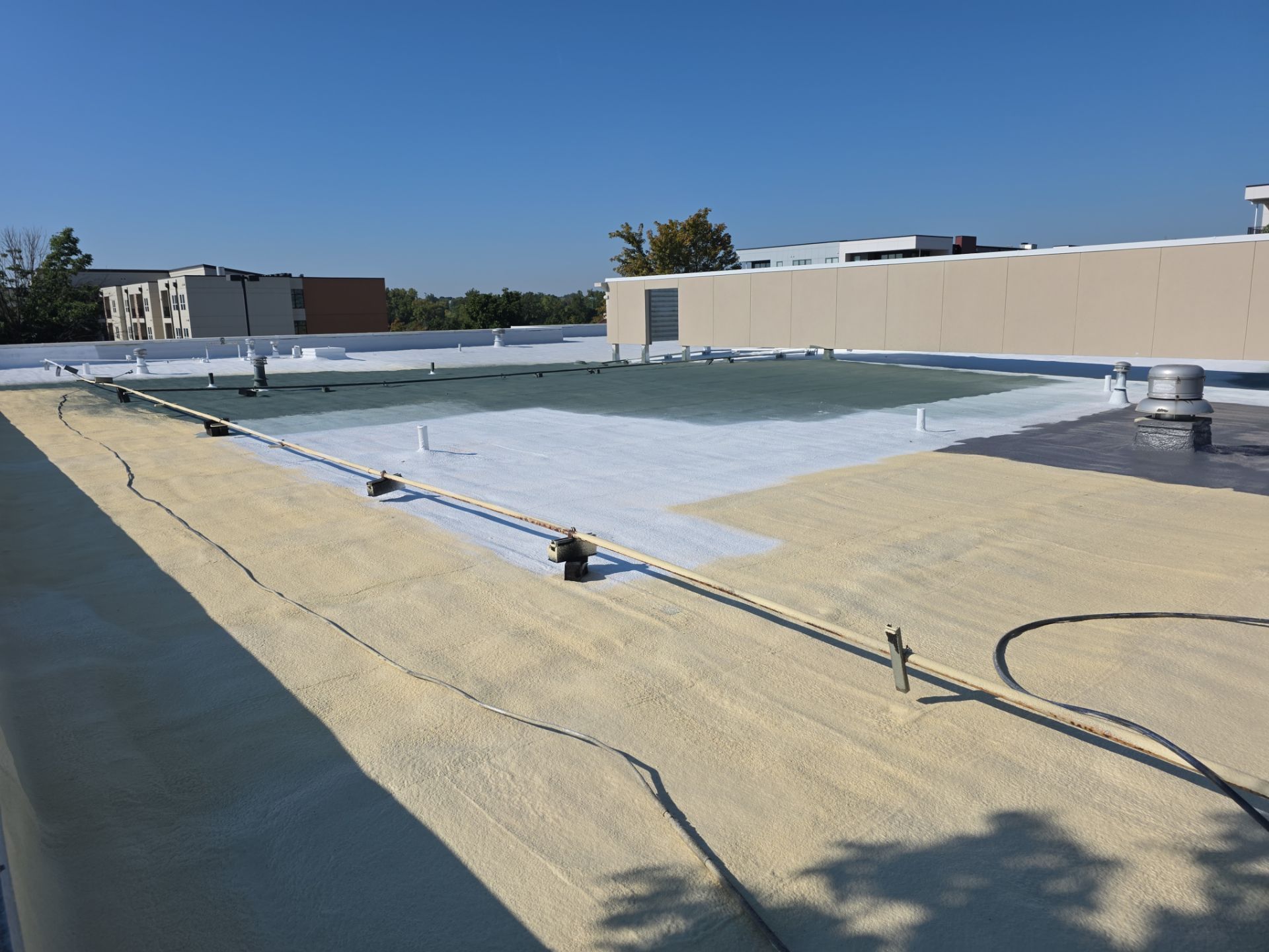 Commercial Roofing Install - SPF Foam & Coatings Restoration & EPDM System - Color White  by Titan Commercial & Residential Roofing 