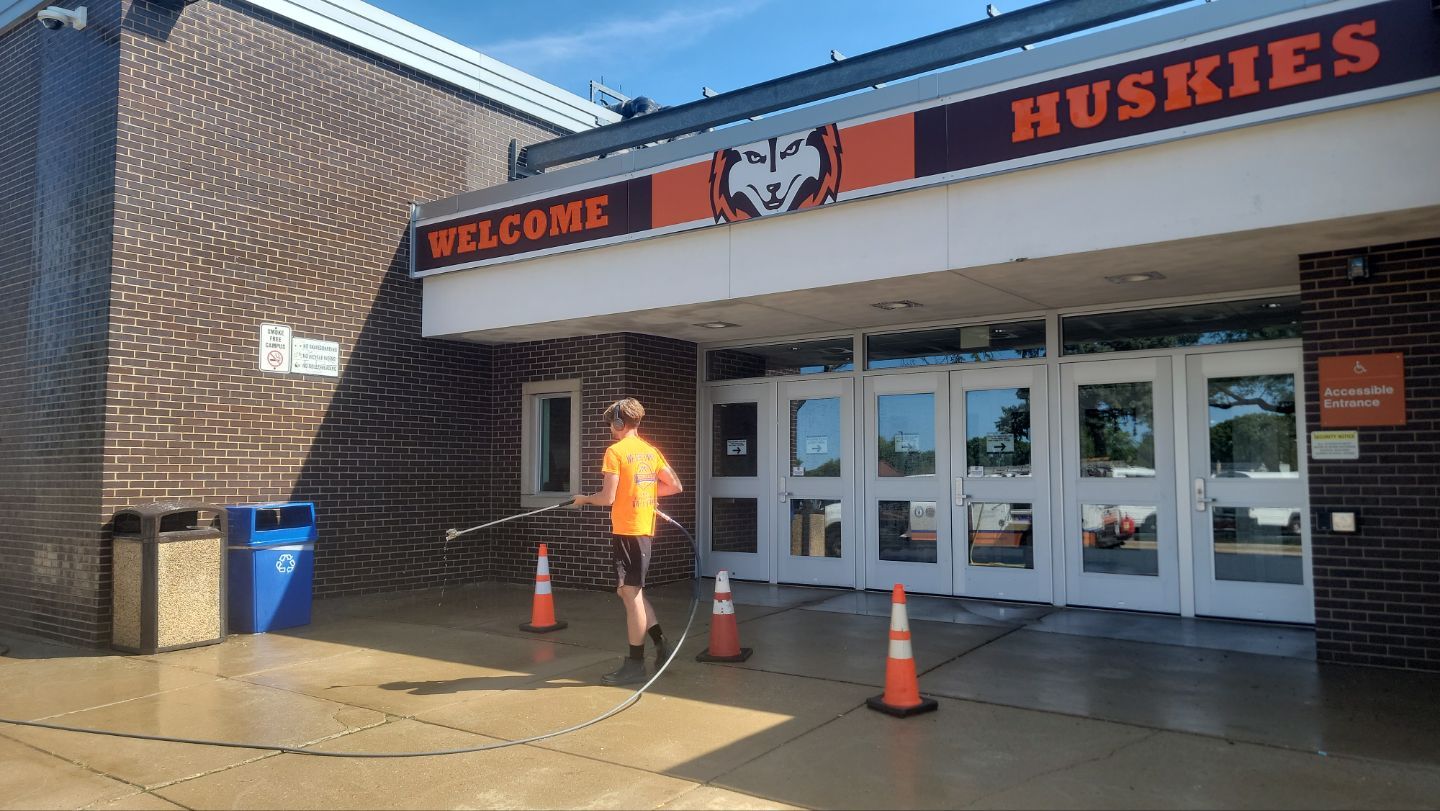 commercial pressure washing using Algaecide, soft wash soap by Northern Power Washing LLC.