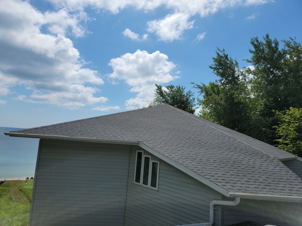 Roof Installation with GAF HDZ Timberline Shingles and Skylight Replacement in Cleveland, WI by Gellings Roofing & Siding