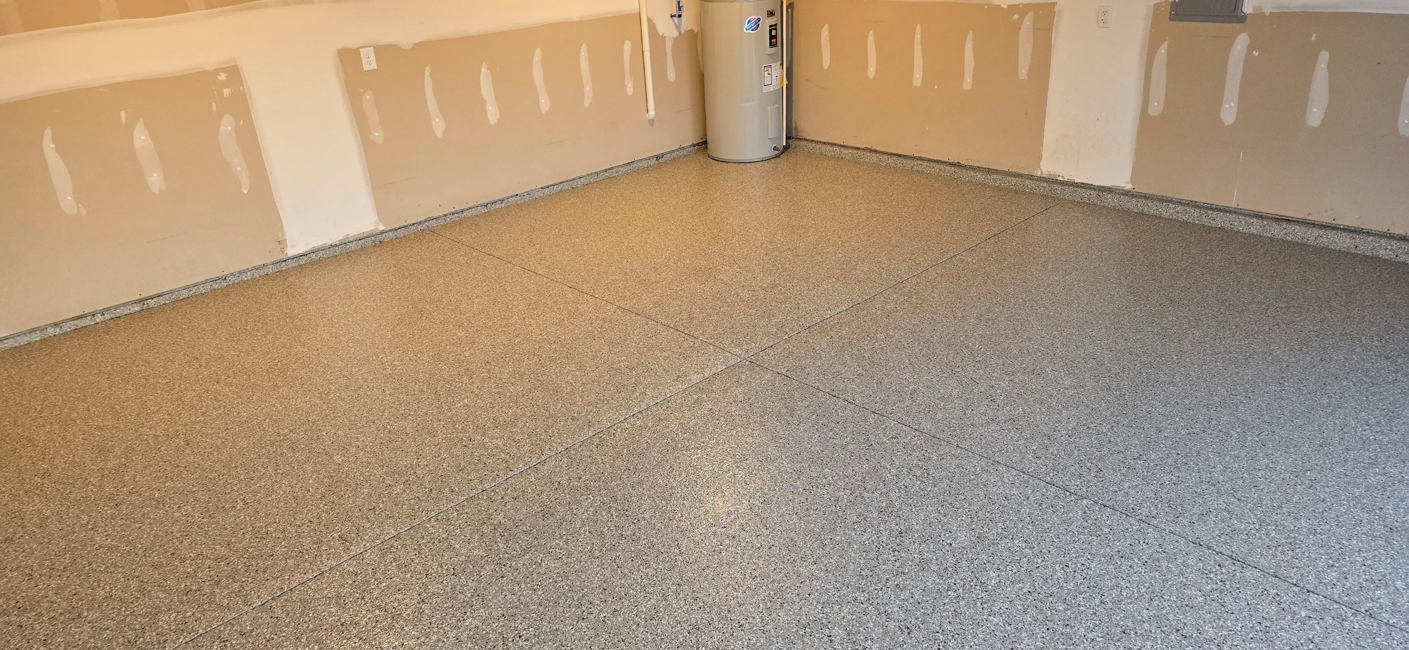Driveway, Garage, & Front Porch using Creekbed by Elite Floor Solutions