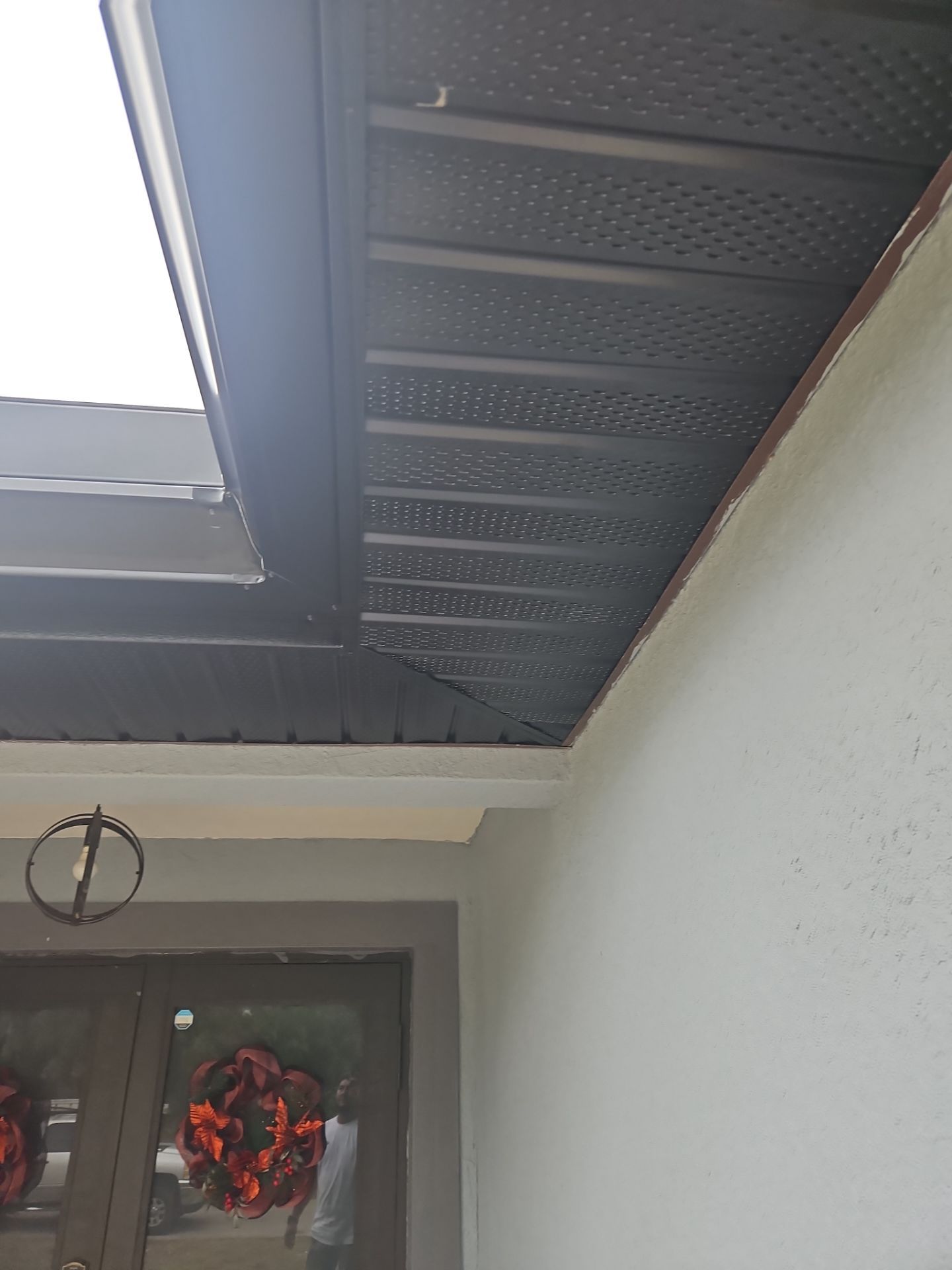 Black Seamless Gutters & Soffit/Fascia in Lehigh Acres FL by Gutter Professors