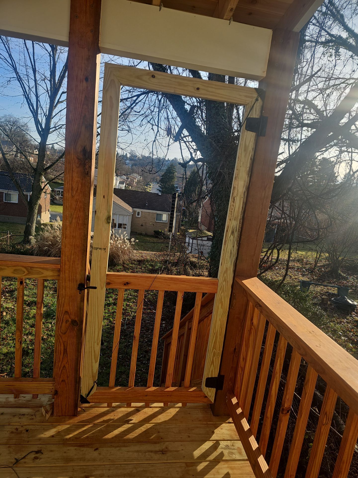 Deck and shed roof by Cousins Roofing Siding & Decks