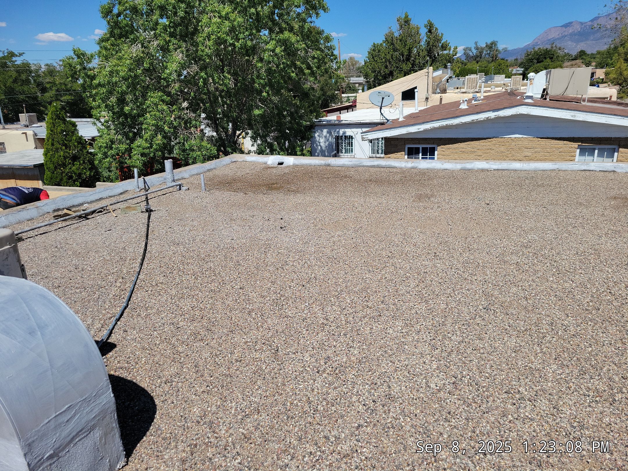 Albuquerque Flat Roof Replacement Using Tan Modified Bitumen Membrane by Doyle Roof Masters Inc