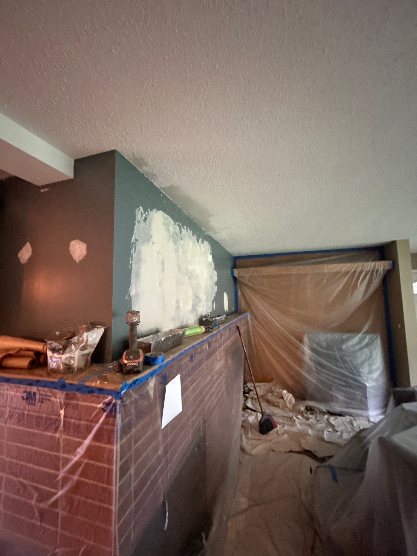 Repaint rooms, and Wallpaper install. by Gordon Painting
