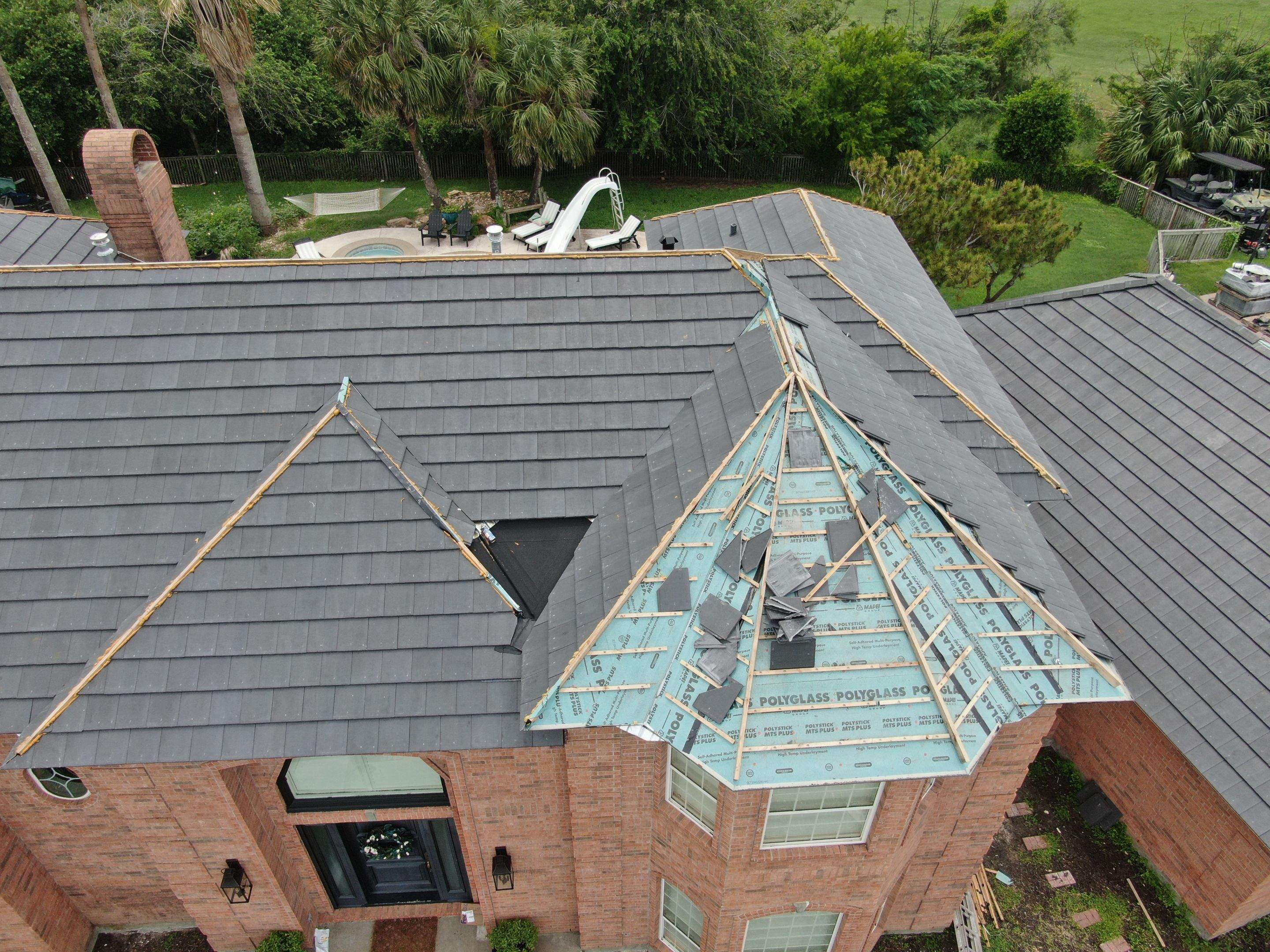 Golf-Proof Tile Roof by Bayfront Roofing and Construction