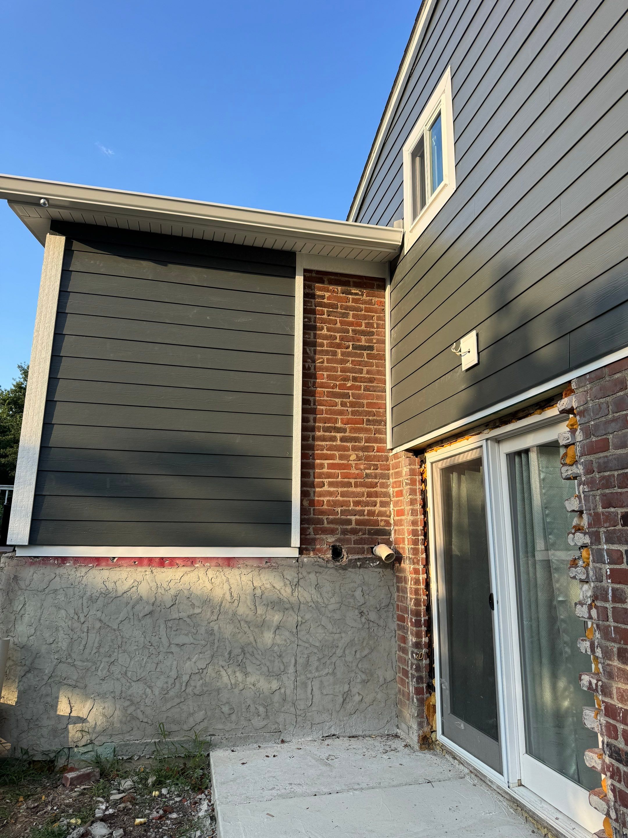 Hardie Siding and Window Project in Bridgeville by Cousins Roofing Siding & Decks