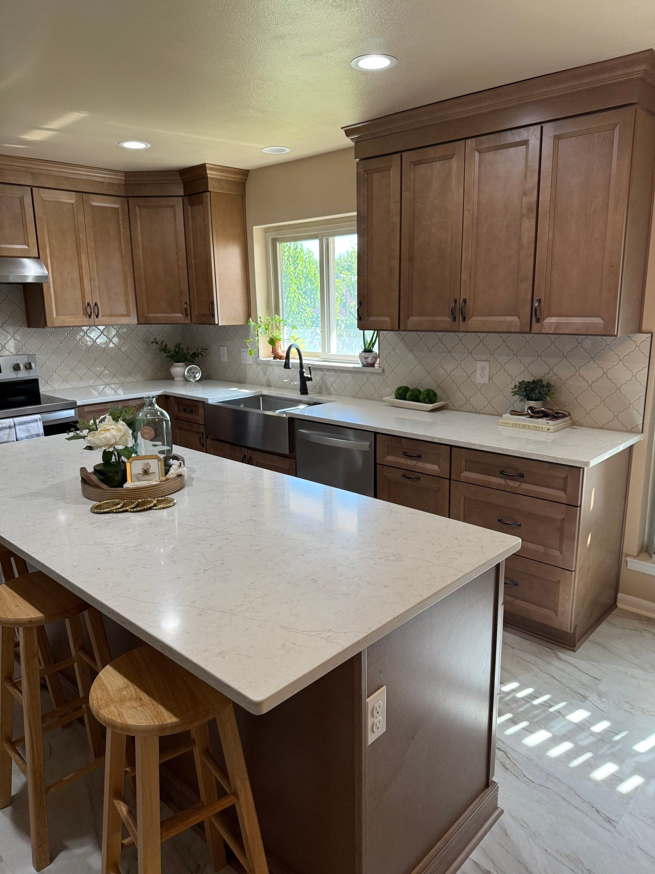 Windcrest Kitchen Remodel Peninsula to Island Before and After by Legacy Bath and Kitchen 
