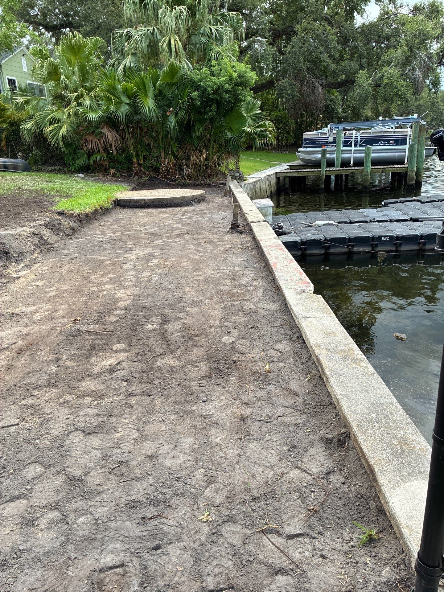 Grading back yard oasis by Level One Grading