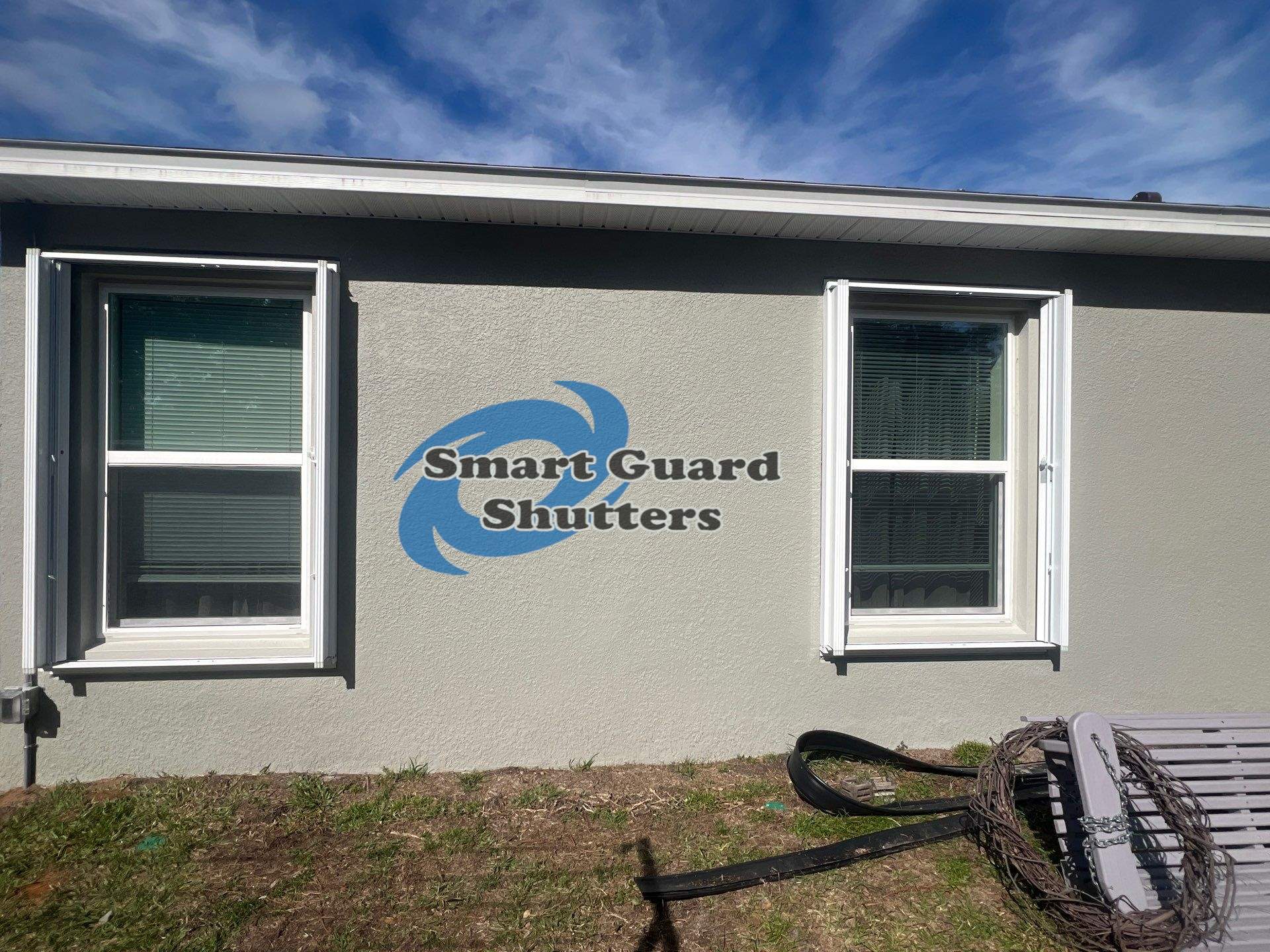 Accordion Shutters in White by Smart Guard Shutters