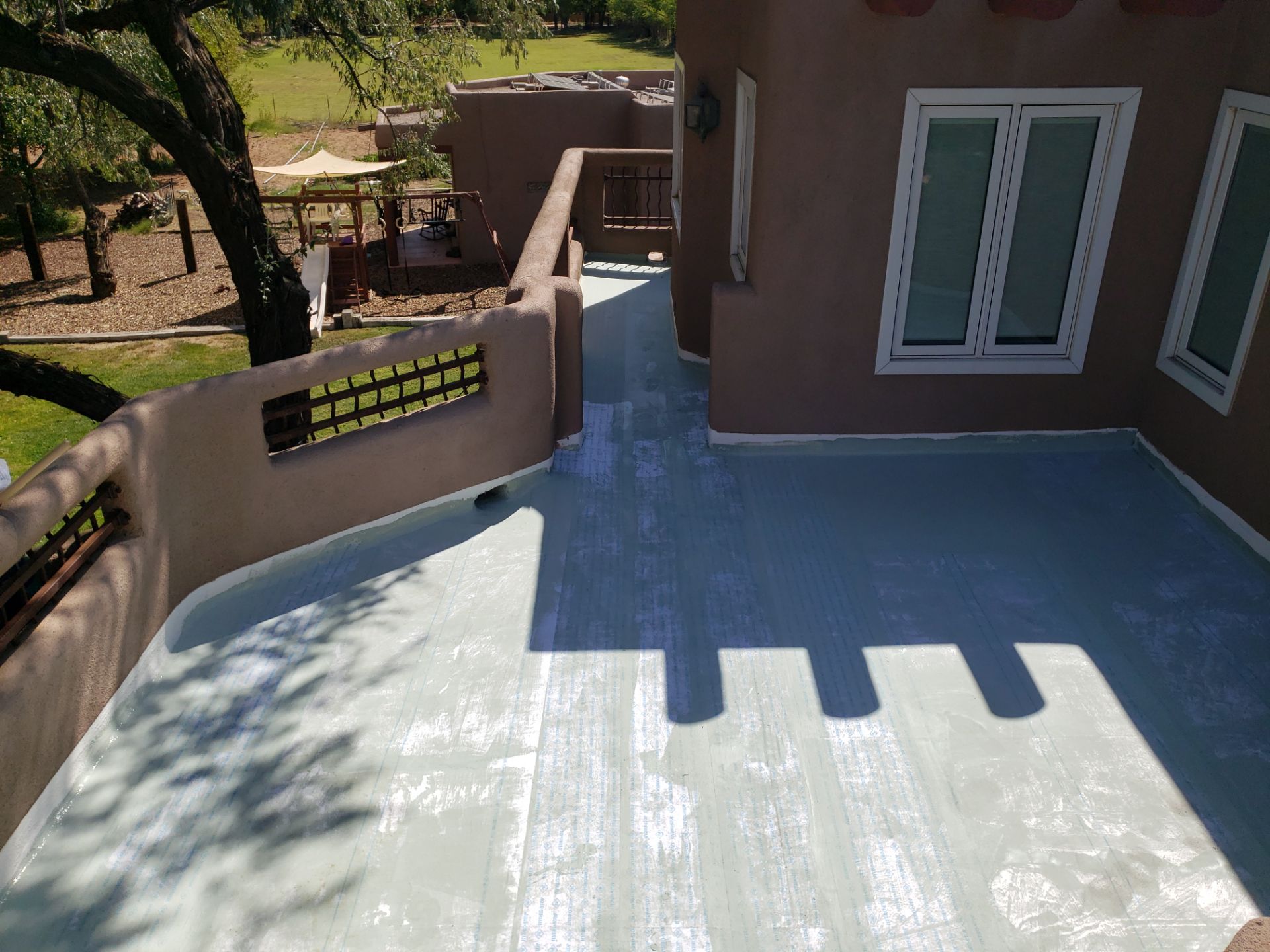 Residential roof application by SPF Services 