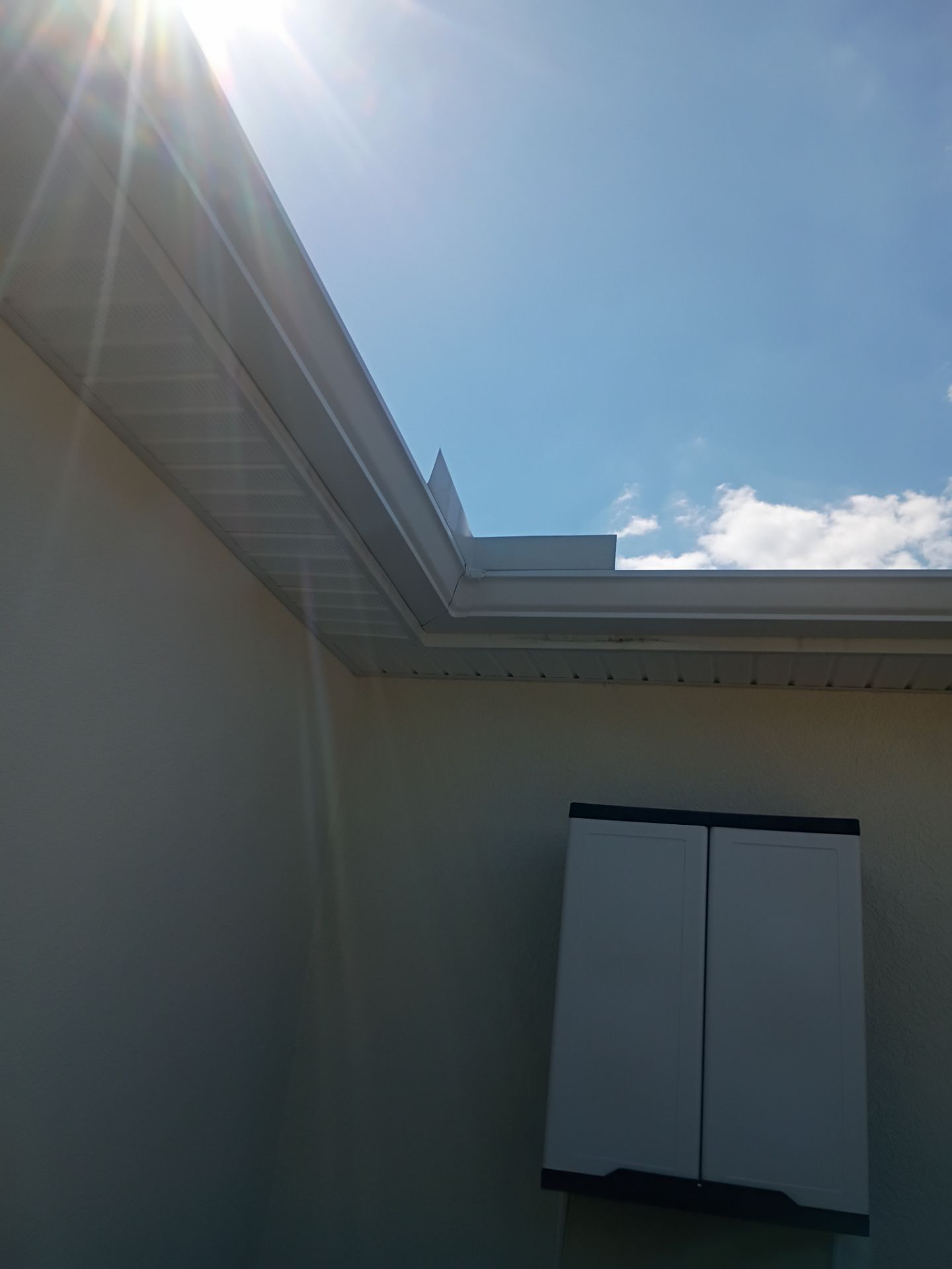 6-inch K-style White Seamless Gutters with Downspouts in North Port, FL by Gutter Professors