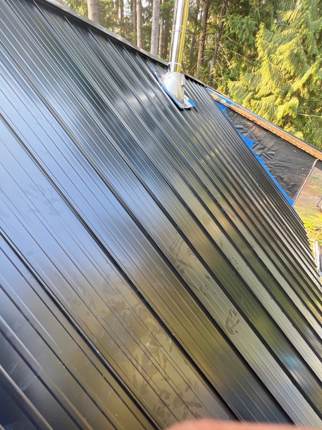 Residential ReRoofing Installation using 12" Prolok metal  by Top Notch Roofing Inc