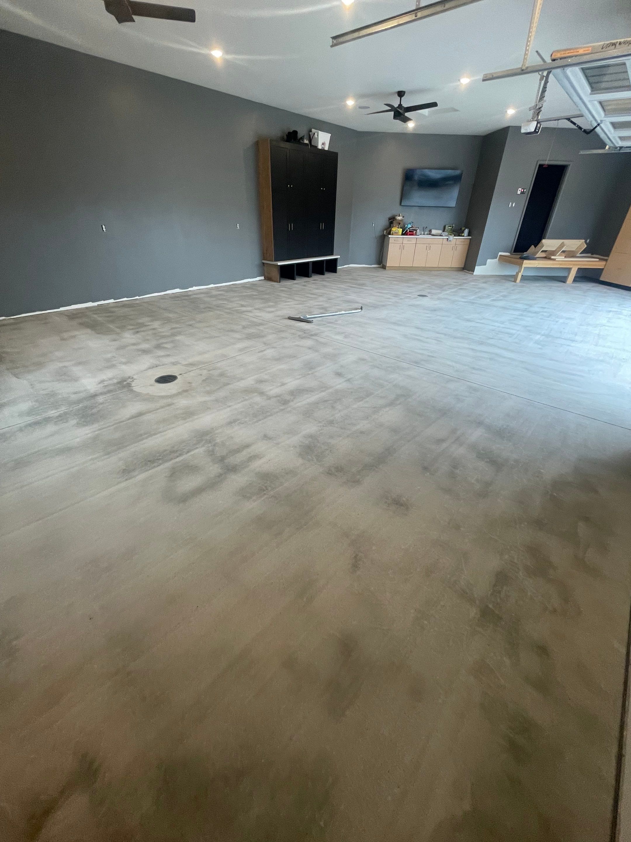 Custom Speckled Concrete Coating for Dell Rapids Garage by Select Painting, Coatings & Garage Cabinets