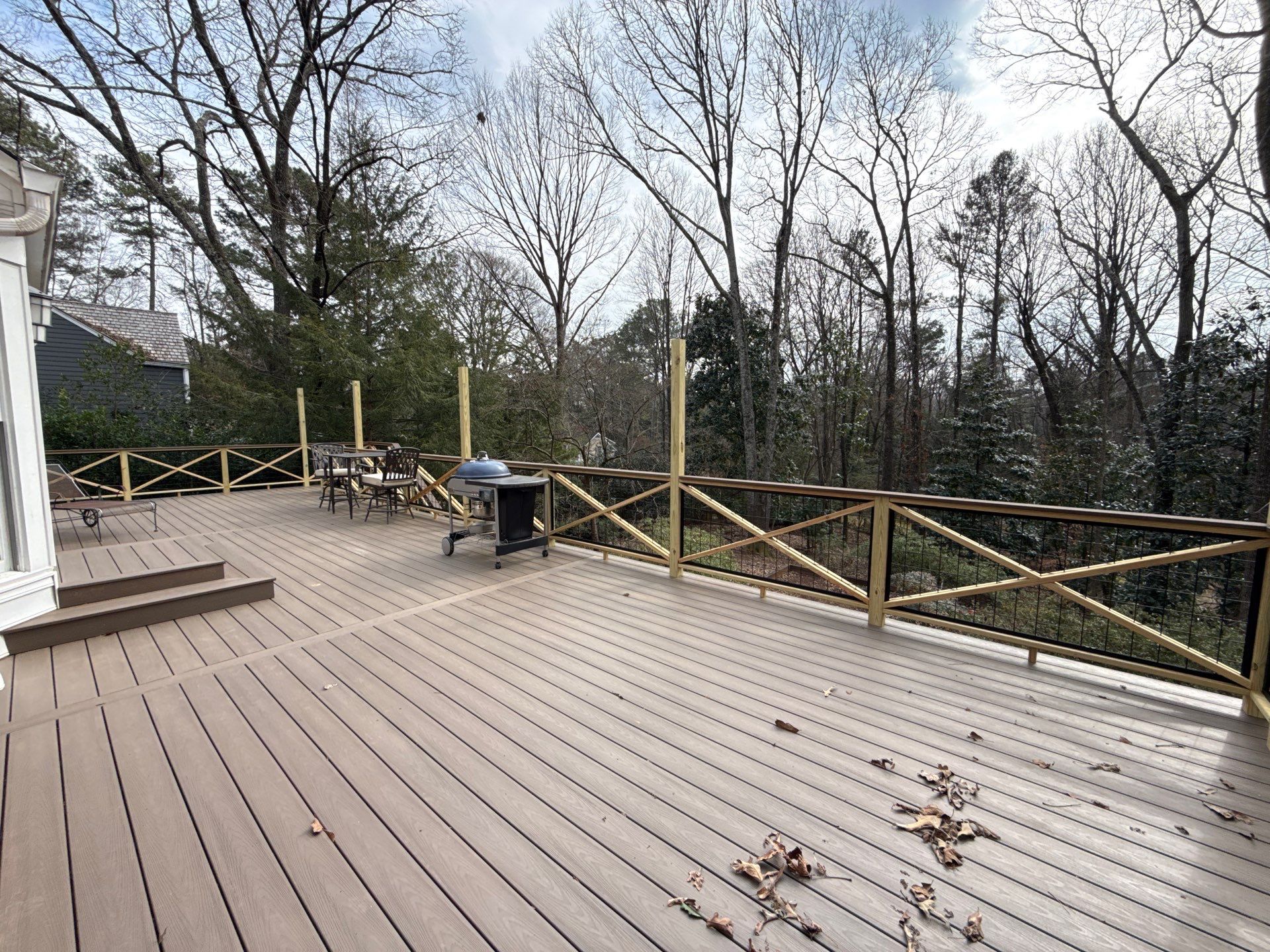 Deck Build and Screened-In Porch Install with Wild Hog 6' Black Mesh Panel Railing by Nelson Exteriors