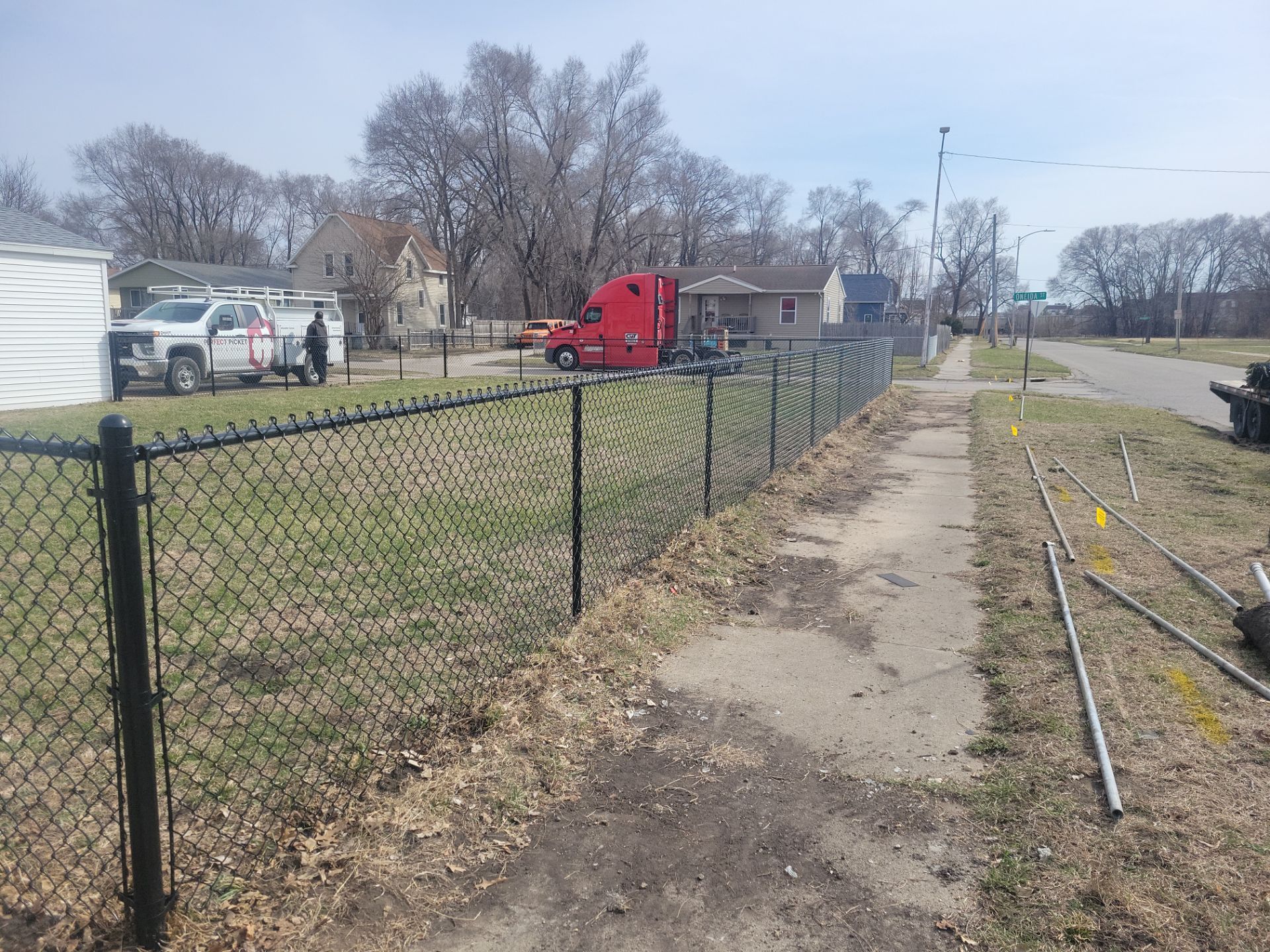 Black Chain Link Fence and Gate Installation in Waterloo by Perfect Picket Fence and Stain