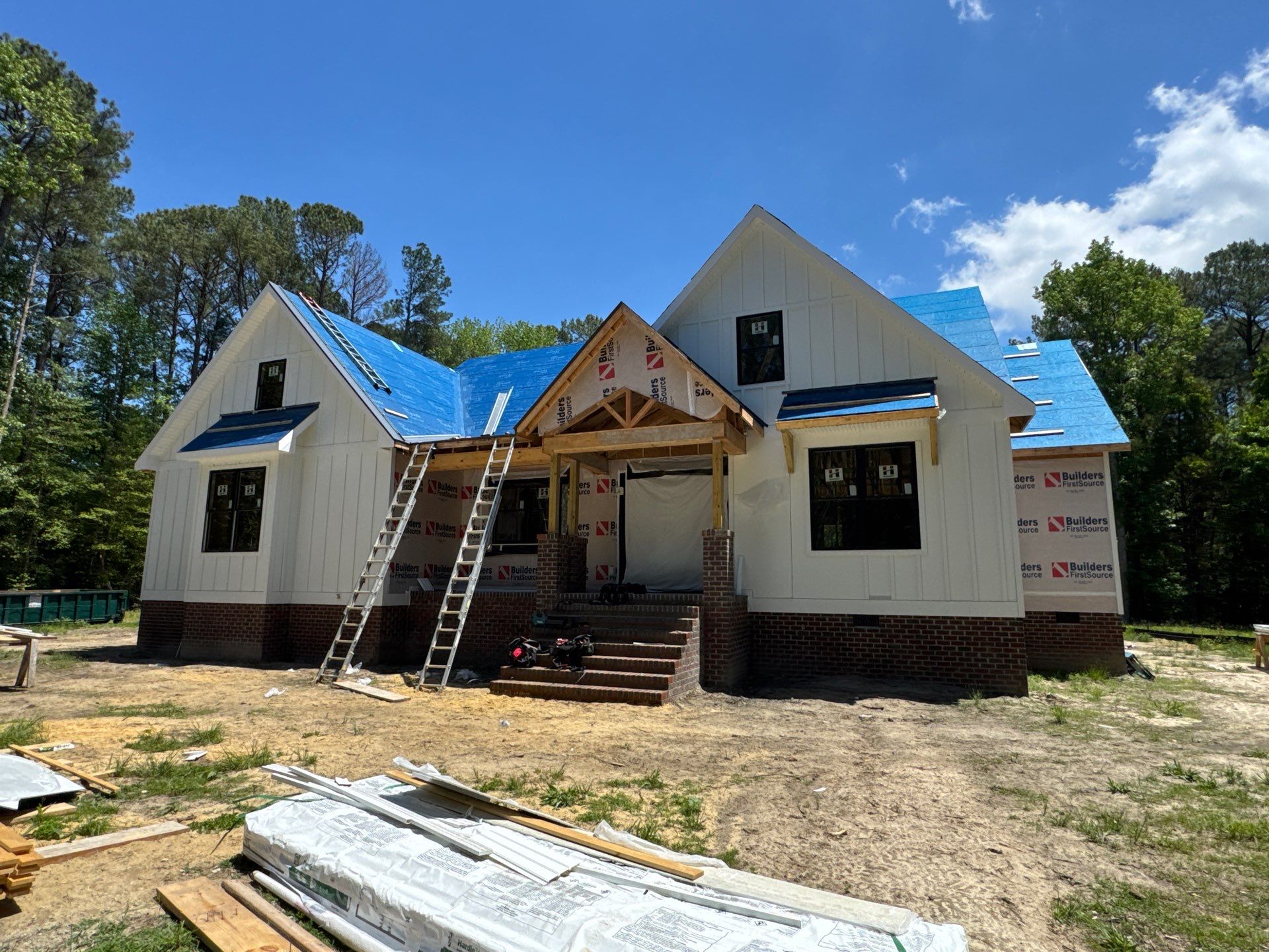 Custom New Construction Home Featuring Standing Seam Metal Roofing in Port Haywood by Cade Construction