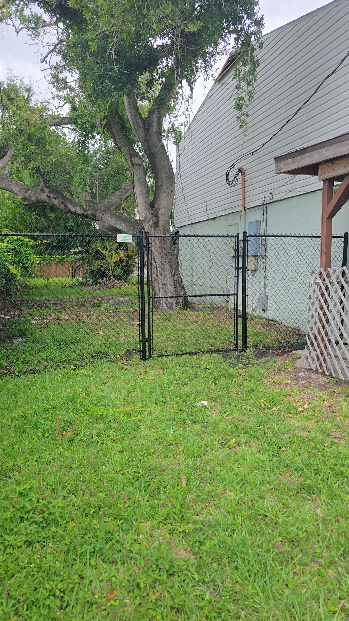 Black Vinyl Chain Link Fence Installation in Bradenton by True Fence LLC