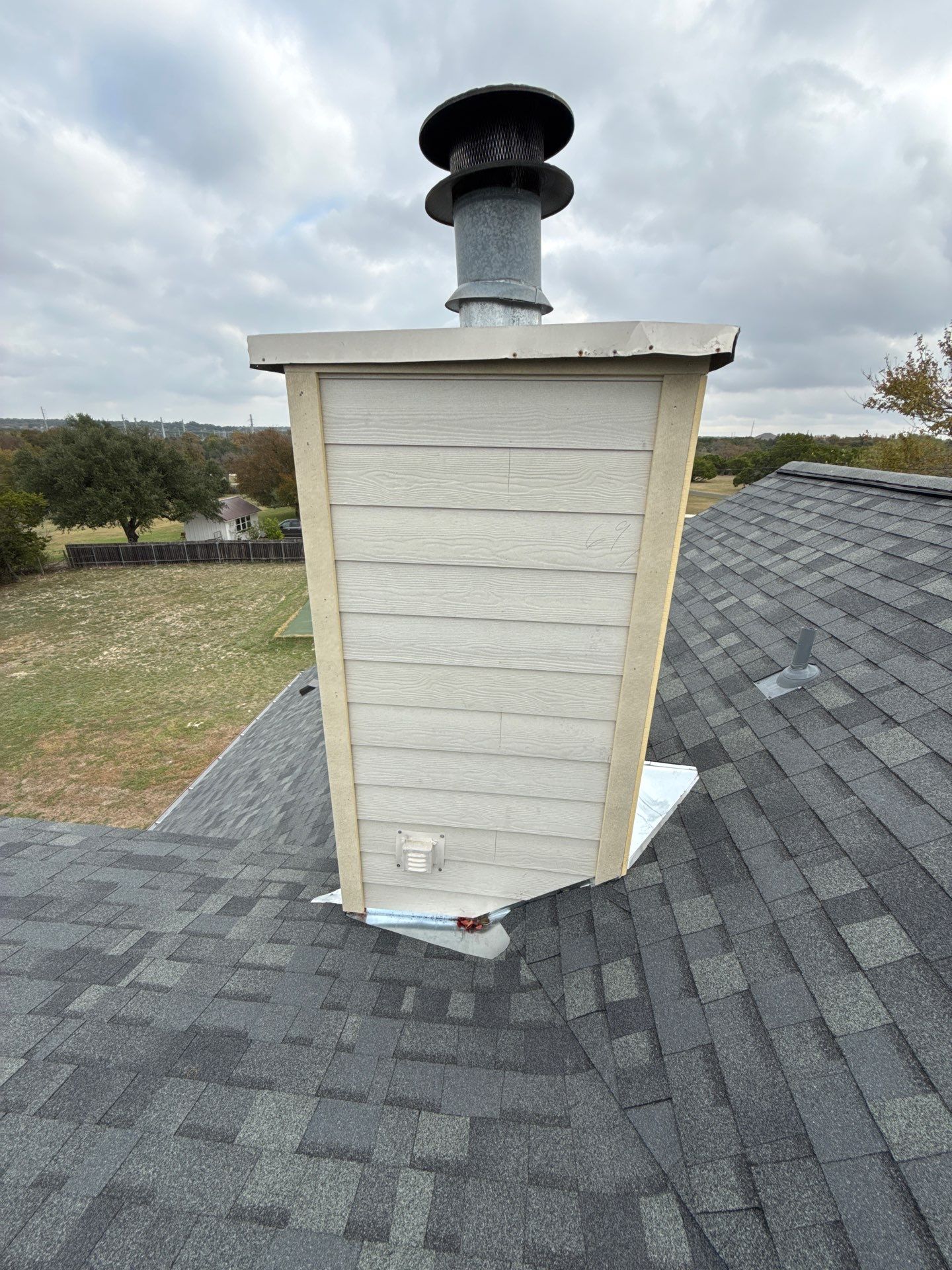 Residential Roof Replacement using Owens Corning - Oakridge - Estate Grey by Action Exteriors Austin