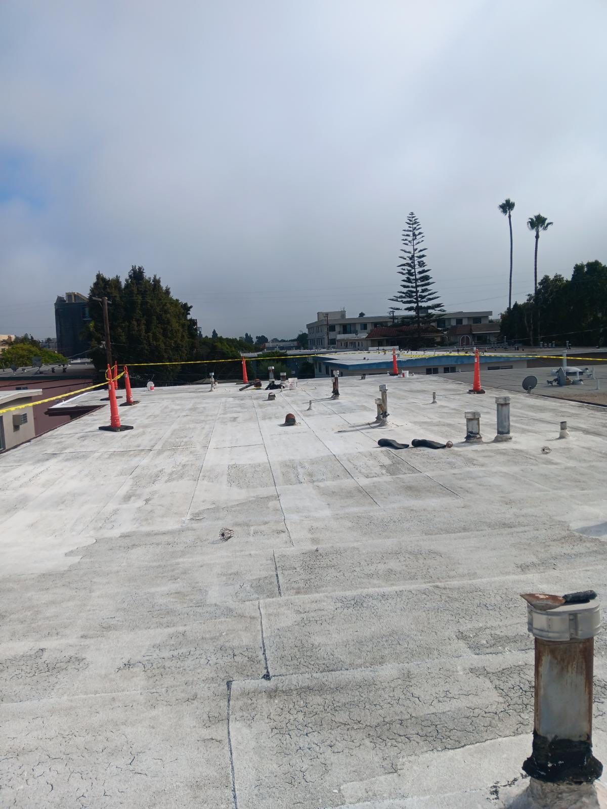 Commercial Roofing Installation using Silicone Coating by Hull Brothers Roofing